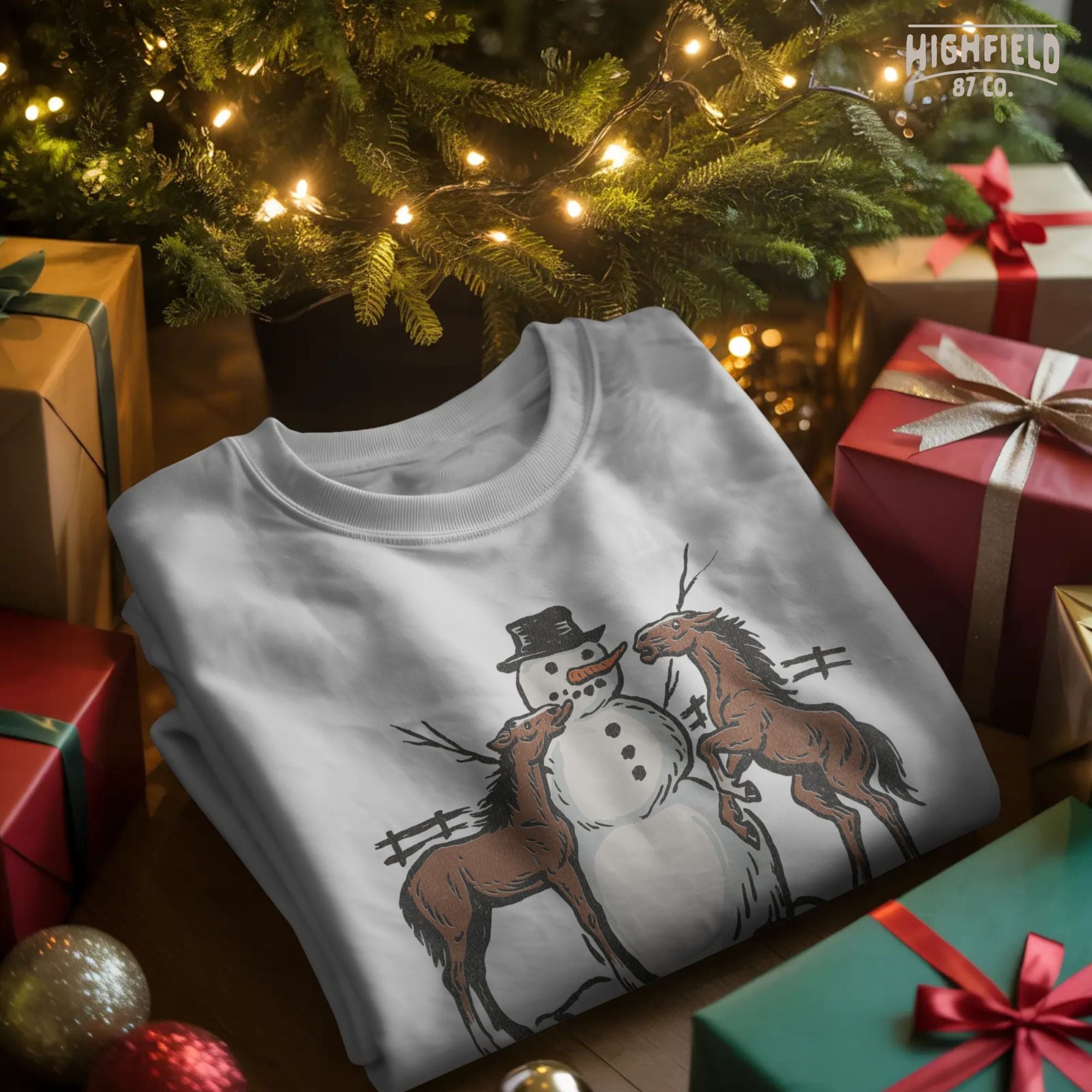 Winter horse PNG showing two brown horses around snowman, rustic countryside theme for farm Christmas crafts.