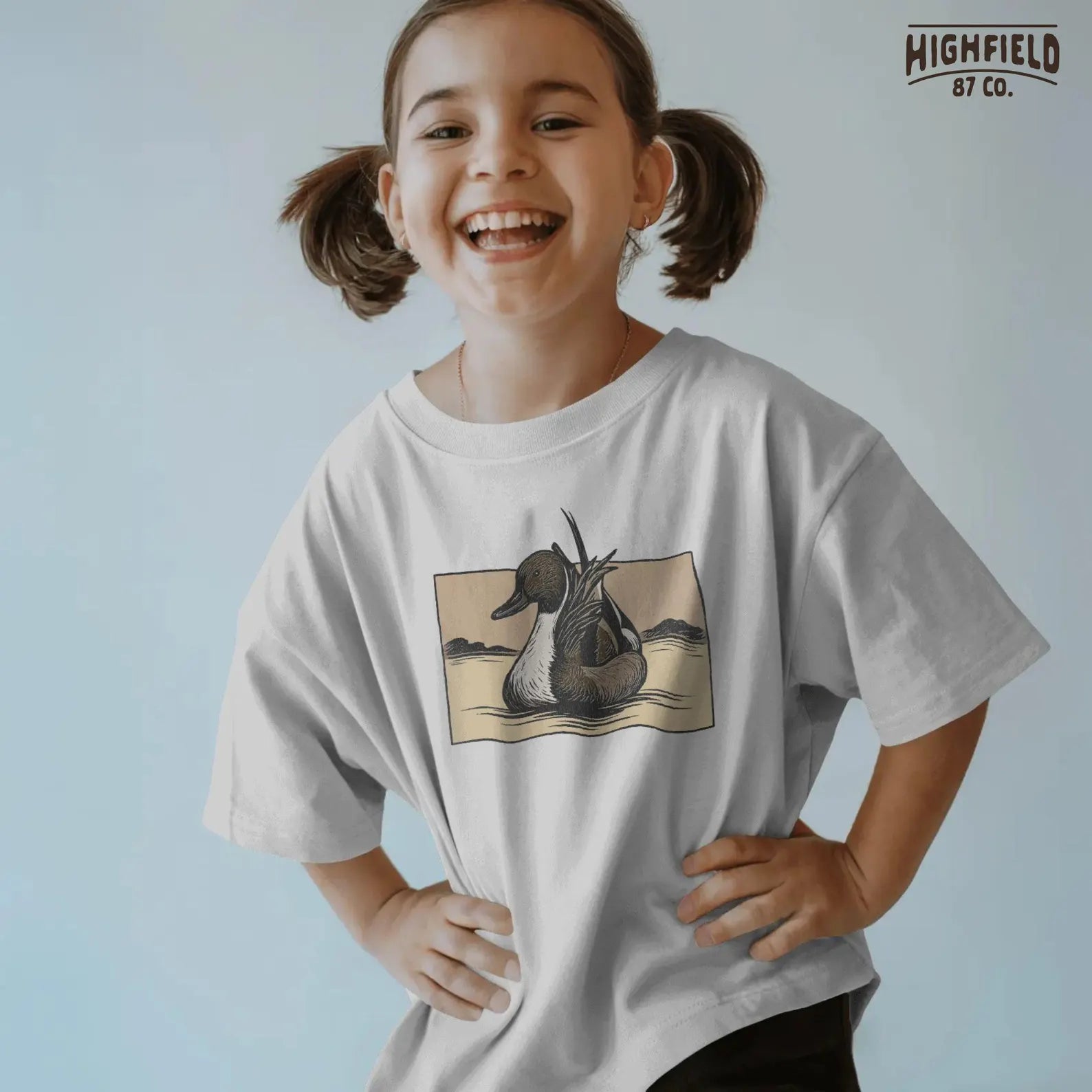 Duck hunting PNG featuring realistic pintail drake resting on lake, perfect for hunters’ apparel and outdoor art designs.