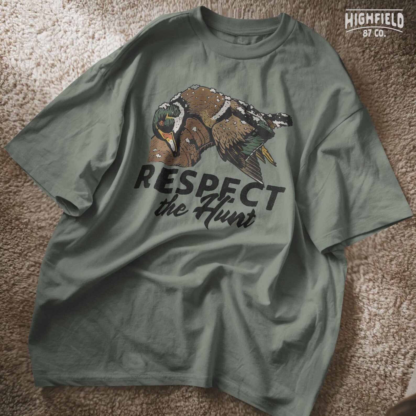 Digital PNG illustration of mallard ducks in winter setting with ice and snow on their wings. Designed for serious hunters—includes “Respect the Hunt” typography.