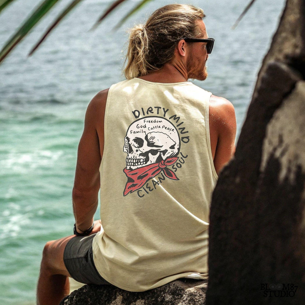 Vintage-style illustration of a cowboy skull wearing a red bandana, featuring handwritten words about freedom, family, and cattle. Perfect for western decor and apparel.