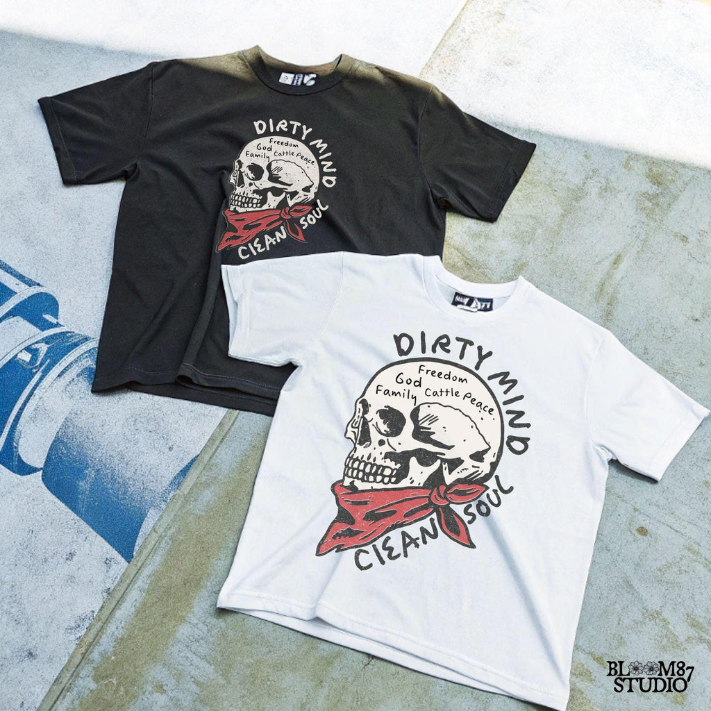 Vintage-style illustration of a cowboy skull wearing a red bandana, featuring handwritten words about freedom, family, and cattle. Perfect for western decor and apparel.