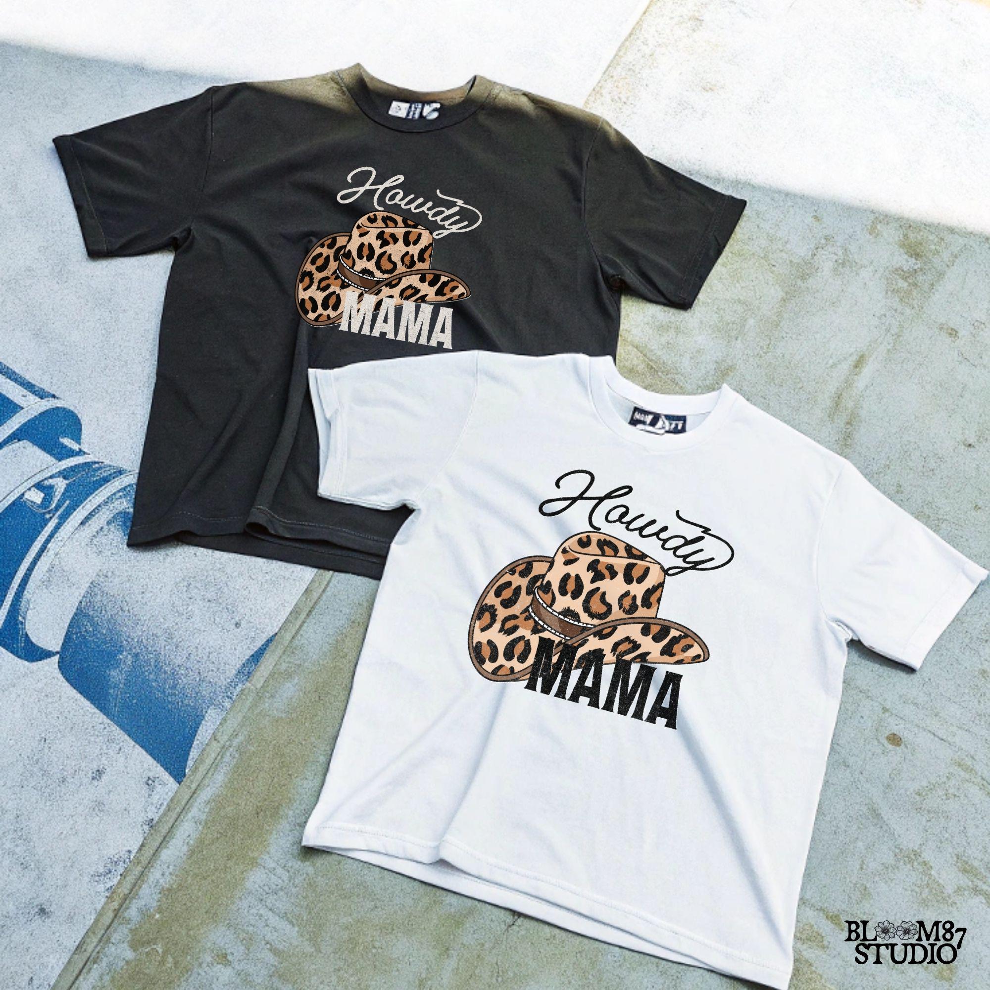 Leopard print cowboy hat with "Howdy Mama" text in a western-style font. Perfect for country-loving moms, rodeo fashion, and cowgirl designs.