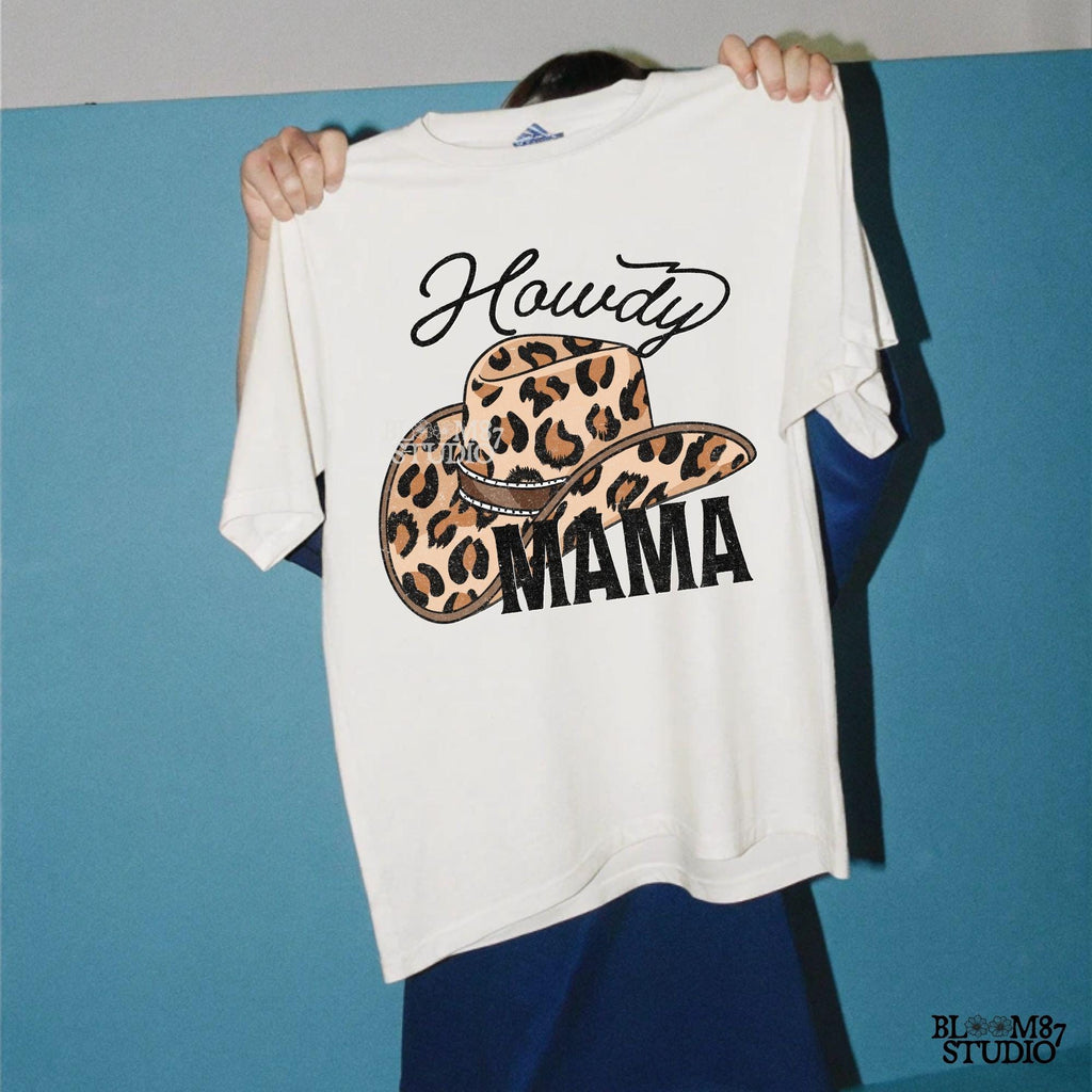 Leopard print cowboy hat with "Howdy Mama" text in a western-style font. Perfect for country-loving moms, rodeo fashion, and cowgirl designs.