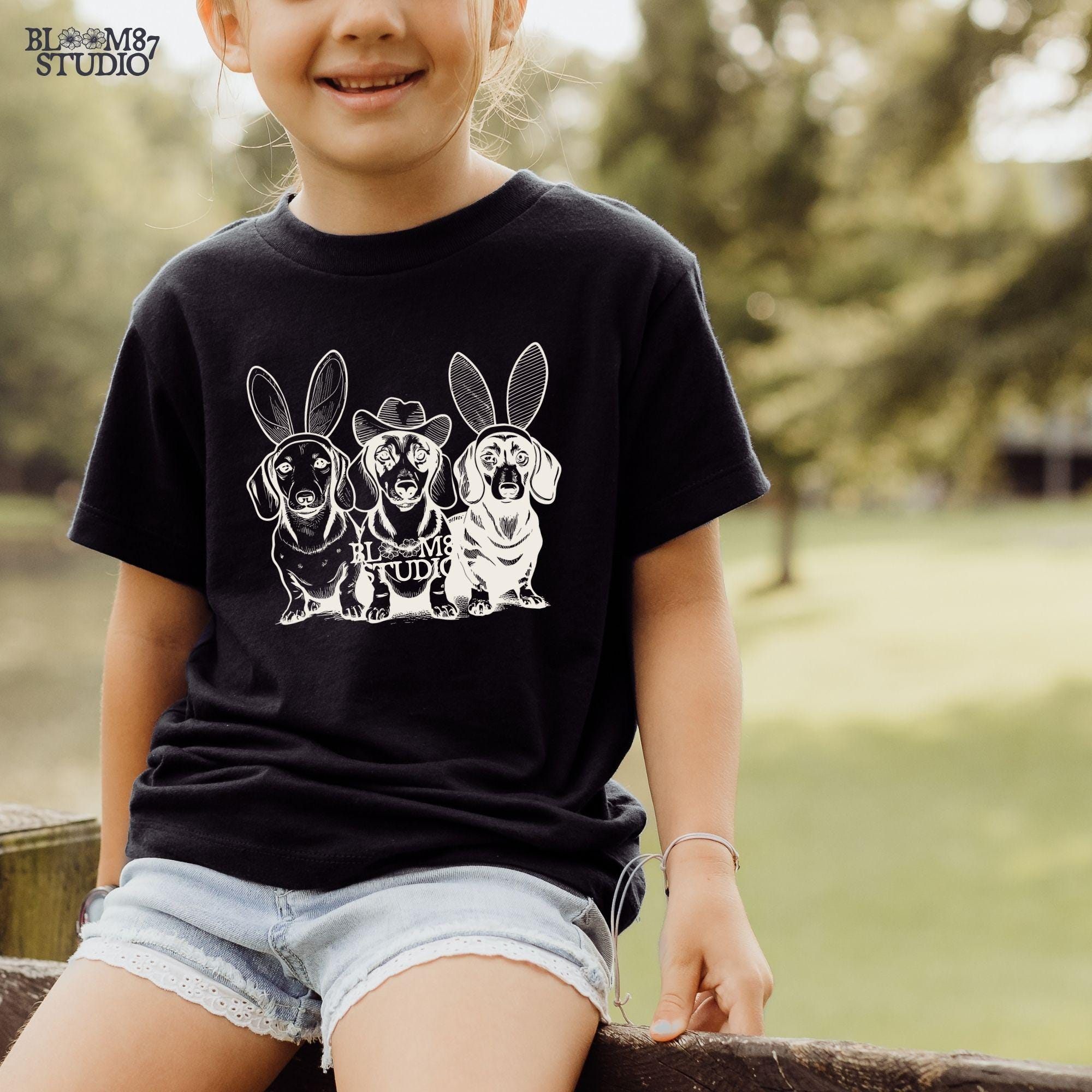 Rustic Easter puppy printable, farmhouse dog mom Easter decor, dachshund bunny print, cowboy hat puppy silhouette, farmhouse rustic dog print, funny farmhouse pet lovers clipart, Easter pet gift printable, farmhouse wiener dog sublimation, rustic dachshund artwork PNG, pet-themed farmhouse decor, rustic Easter gift for dog lovers, farmhouse aesthetic Easter artwork, adorable country dog, cute dachshund decor PNG, funny rustic dog lovers, Etsy farmhouse Easter aesthetic, country dog mom PNG