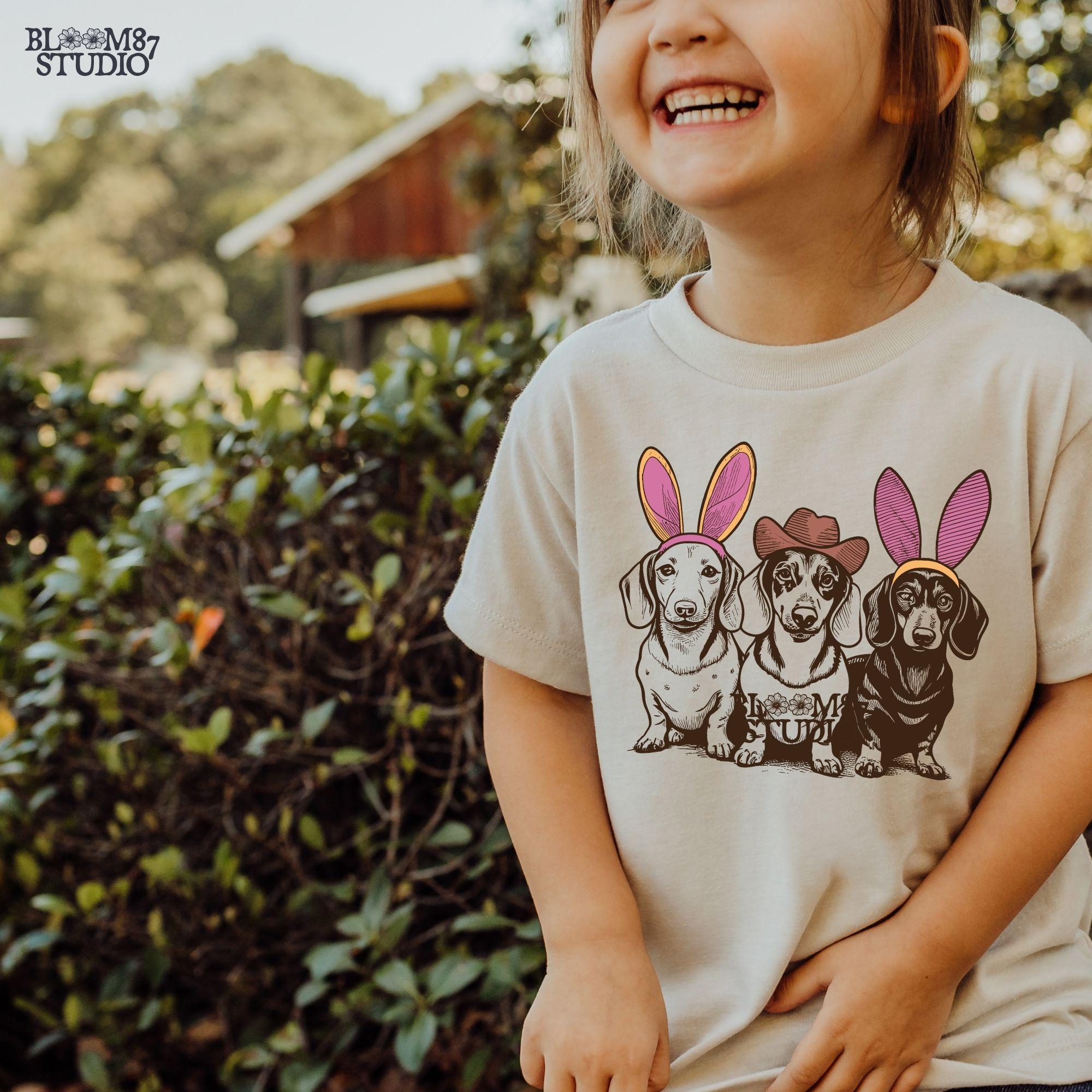 Dachshund digital download, funny dog owners print, Etsy dachshund lover PNG, rustic puppy graphic, wiener dog ears clipart, adorable dachshund T-shirt design, sausage dog digital artwork, pet owners funny clipart, Etsy dog mom Easter sublimation, cowboy hat dog PNG, dachshund cowboy clipart, funny dog lovers Easter design, sausage dog bunny ears printable, rustic farmhouse Easter puppy artwork, adorable dachshund pet lovers, Etsy funny dog print, rustic Easter pet, dachshund puppy printable PNG