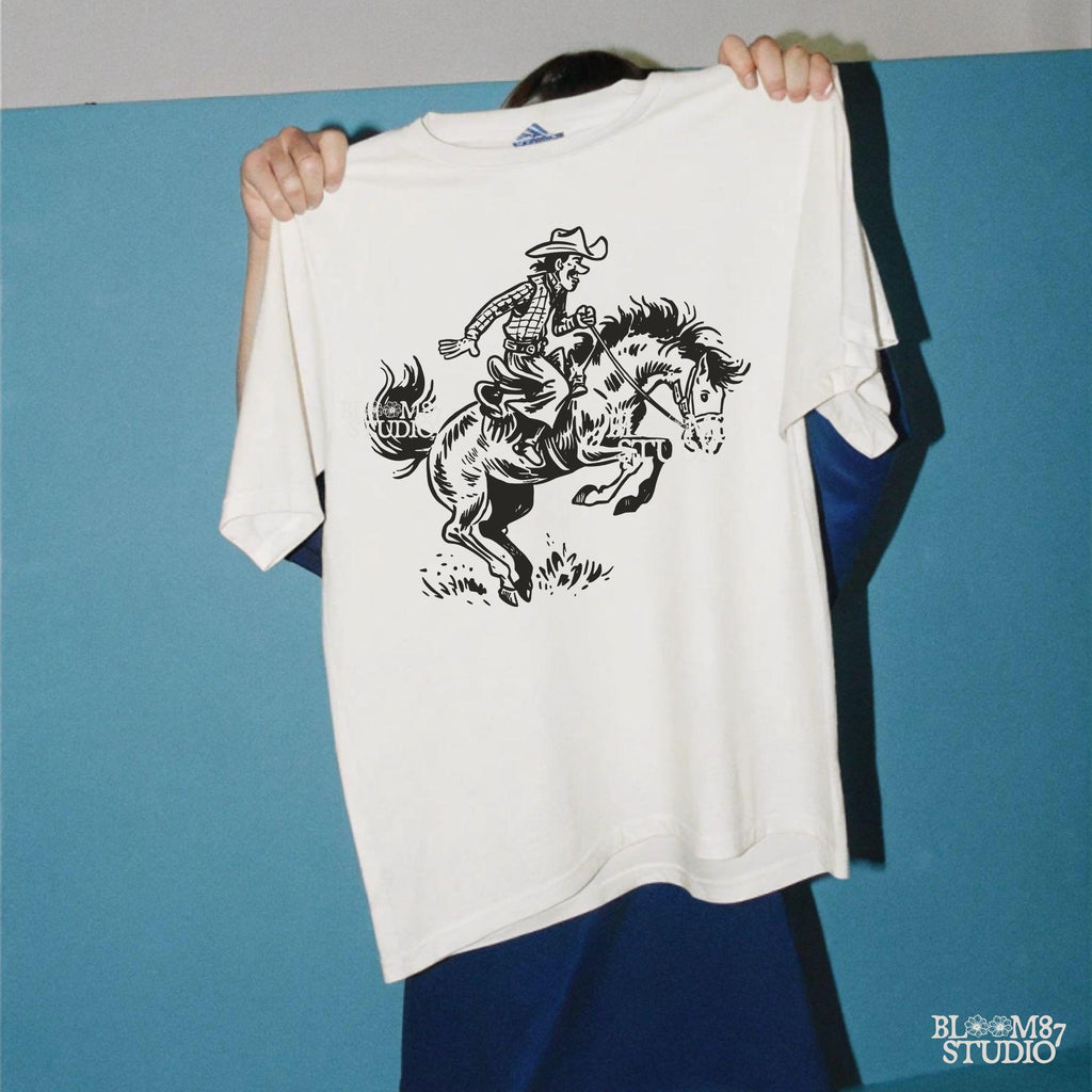Perfect for country music fans, Western enthusiasts, and rodeo athletes looking for a bold, vintage cowboy design.
