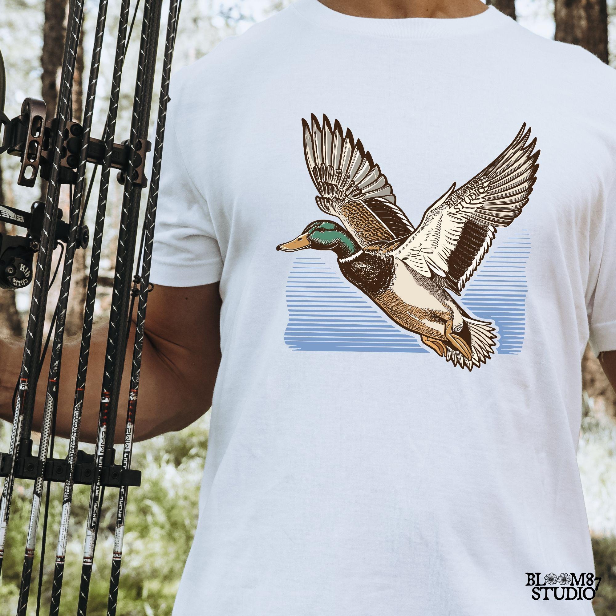 Waterfowl PNG for sublimation, duck hunter decor download, rustic cabin duck design, printable bird artwork, soaring duck digital art, mallard wall decor printable, duck in midair image, traditional duck hunter style, birdwatcher shirt design, mallard on the wing