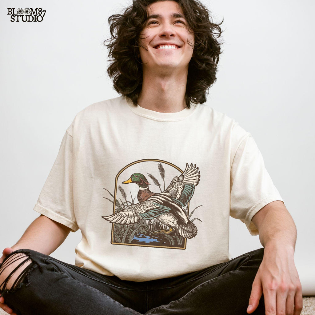 wetlands duck artwork, flying duck clipart png, mallard for t-shirt design, duck decal file png, outdoor wildlife bird png, printable duck art, duck png sublimation design, mallard flying through reeds, vintage duck graphics, rustic print file