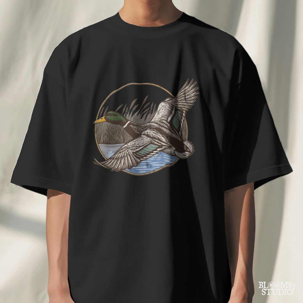 "Vintage flying mallard duck PNG clipart in marsh scene, rustic wildlife sublimation design for duck hunting shirts and outdoor gear"