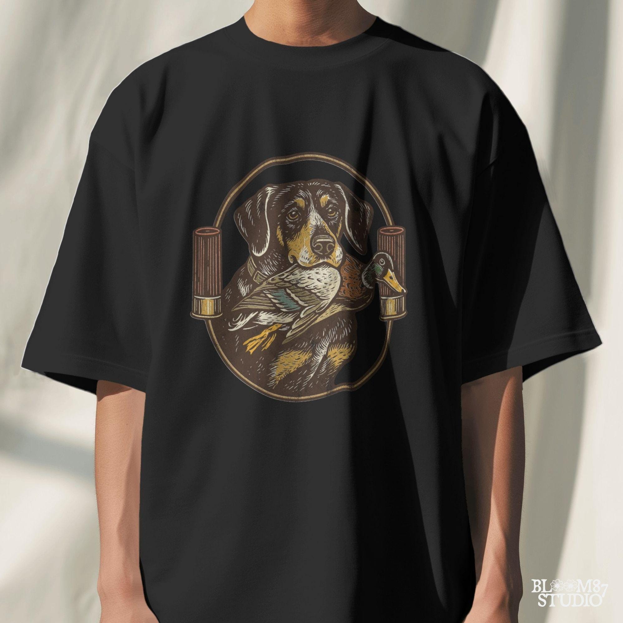 "Duck hunting dog PNG with mallard and shotgun shells, vintage retriever badge style sublimation for hunting shirt designs"