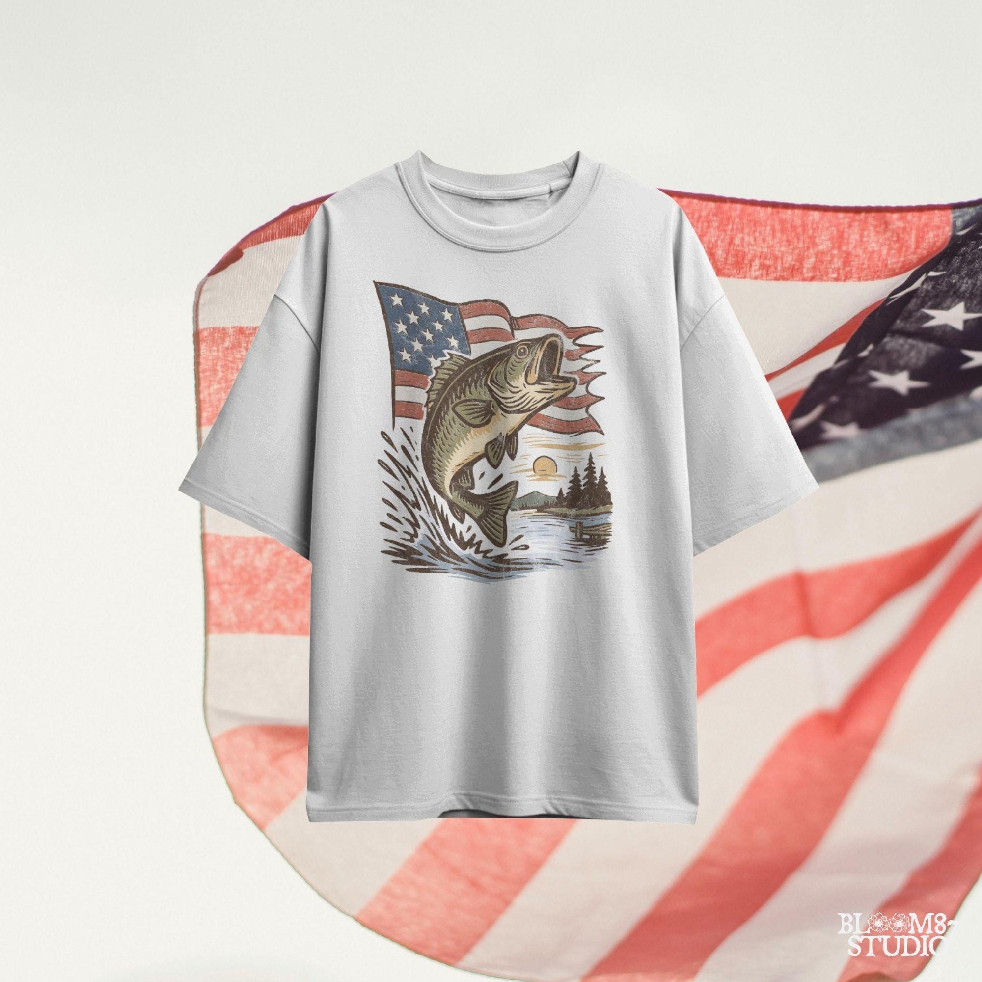 Vintage-style largemouth bass jumping in front of waving American flag with lake sunset – patriotic fishing PNG design for 4th of July and USA outdoor lovers