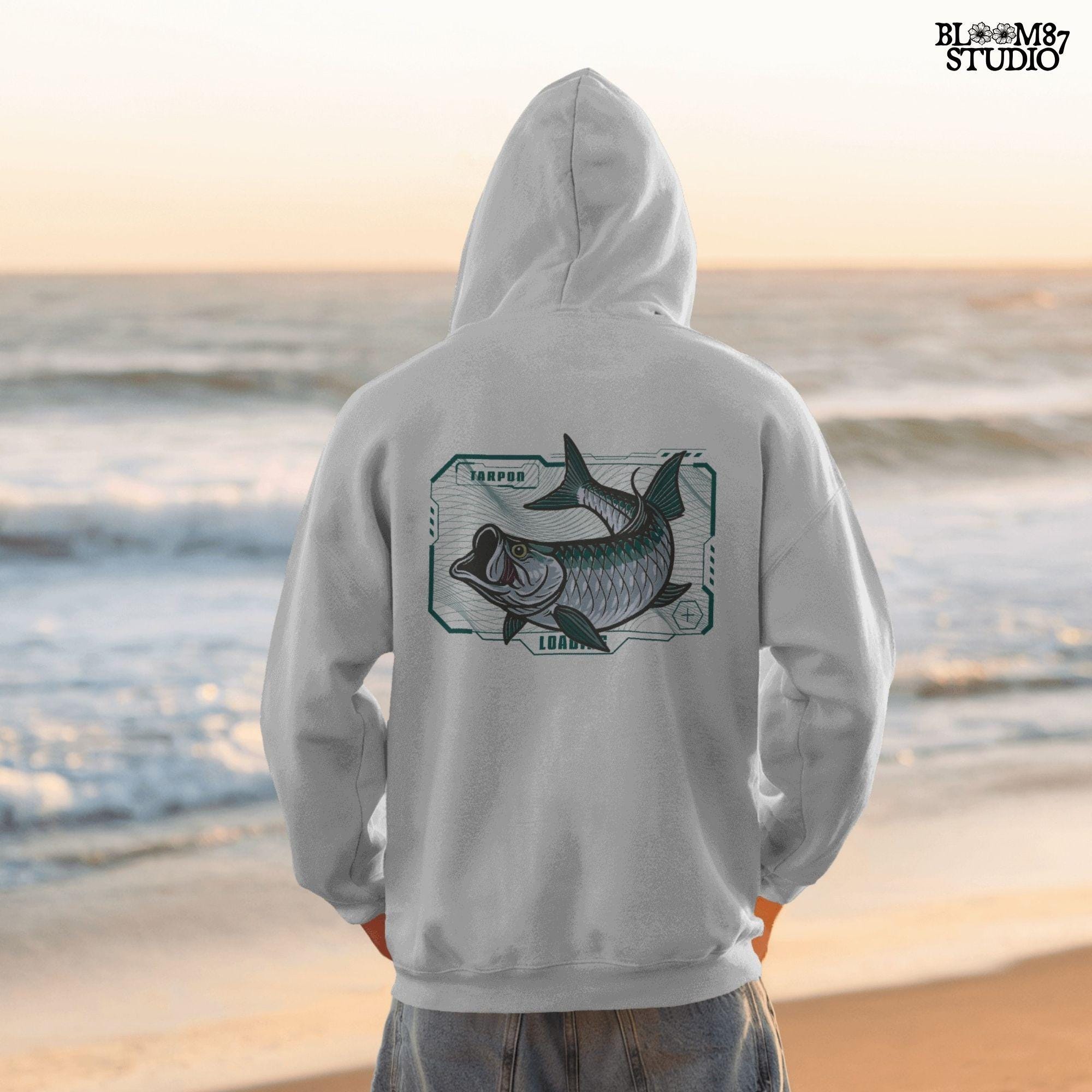 Futuristic digital-style tarpon fish leaping with techcore background – cyber ocean fishing design for sublimation and offshore anglers