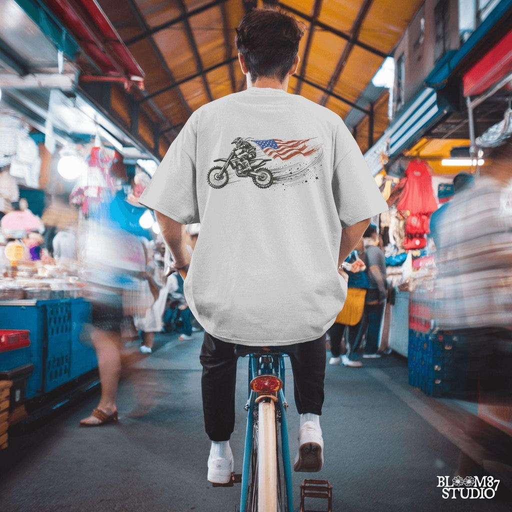 motocross silhouette png, stunt bike patriotic design, usa extreme sports shirt, motocross event printable, rider with american flag png, motorbike fireworks art, freedom fueled design, 4th of july garage shirt