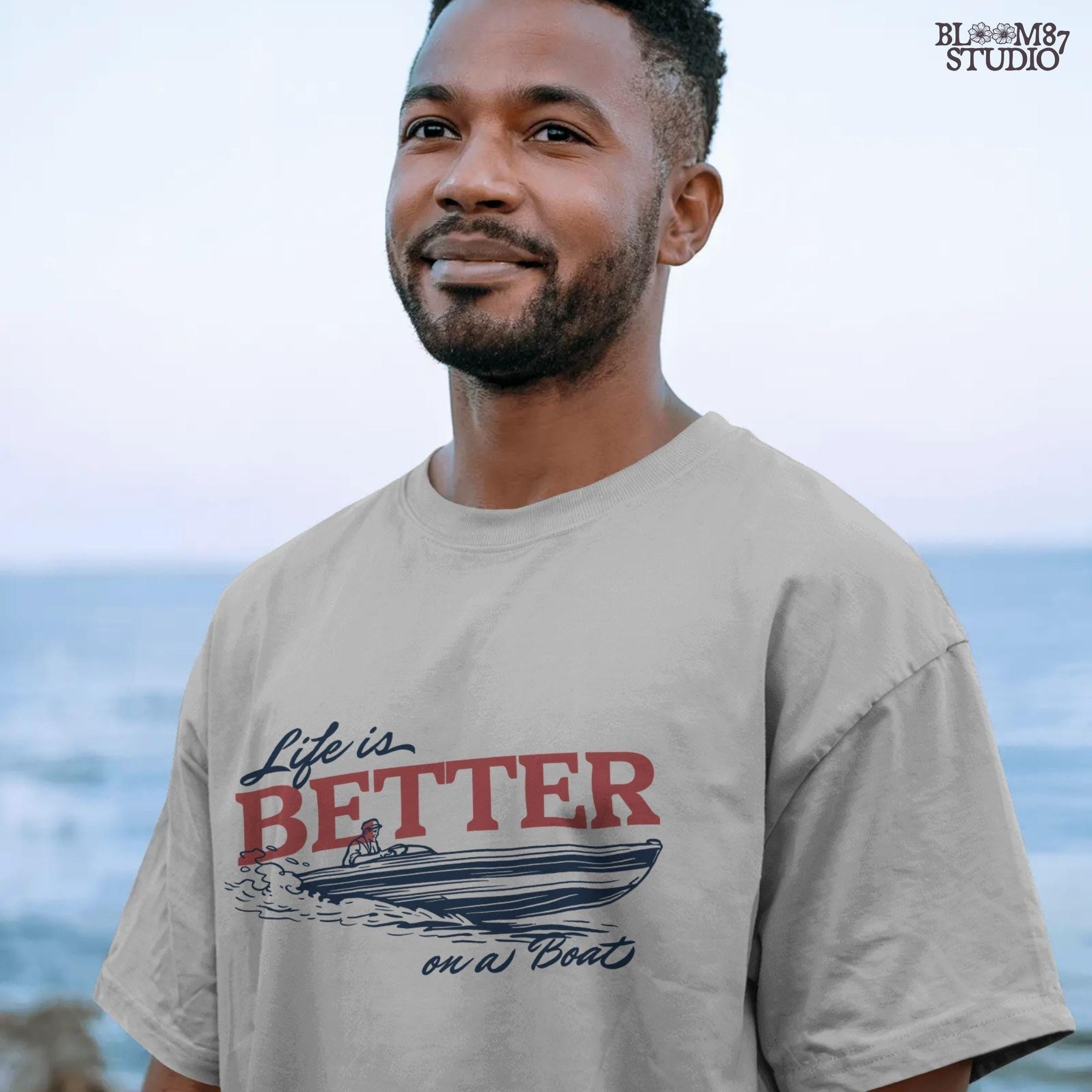 “Retro-style illustration of a man driving a speedboat with bold ‘Life is Better on a Boat’ typography, perfect for summer boating lovers.”