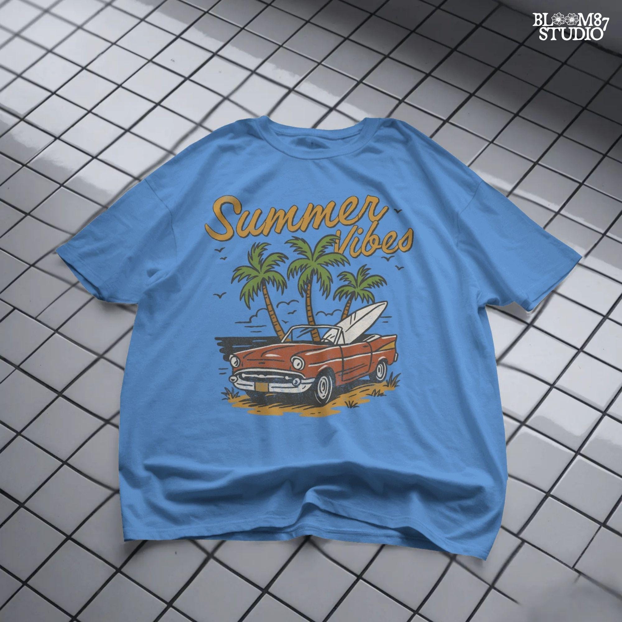 Red vintage convertible parked near palm trees at the beach with a surfboard and “Summer Vibes” text above.