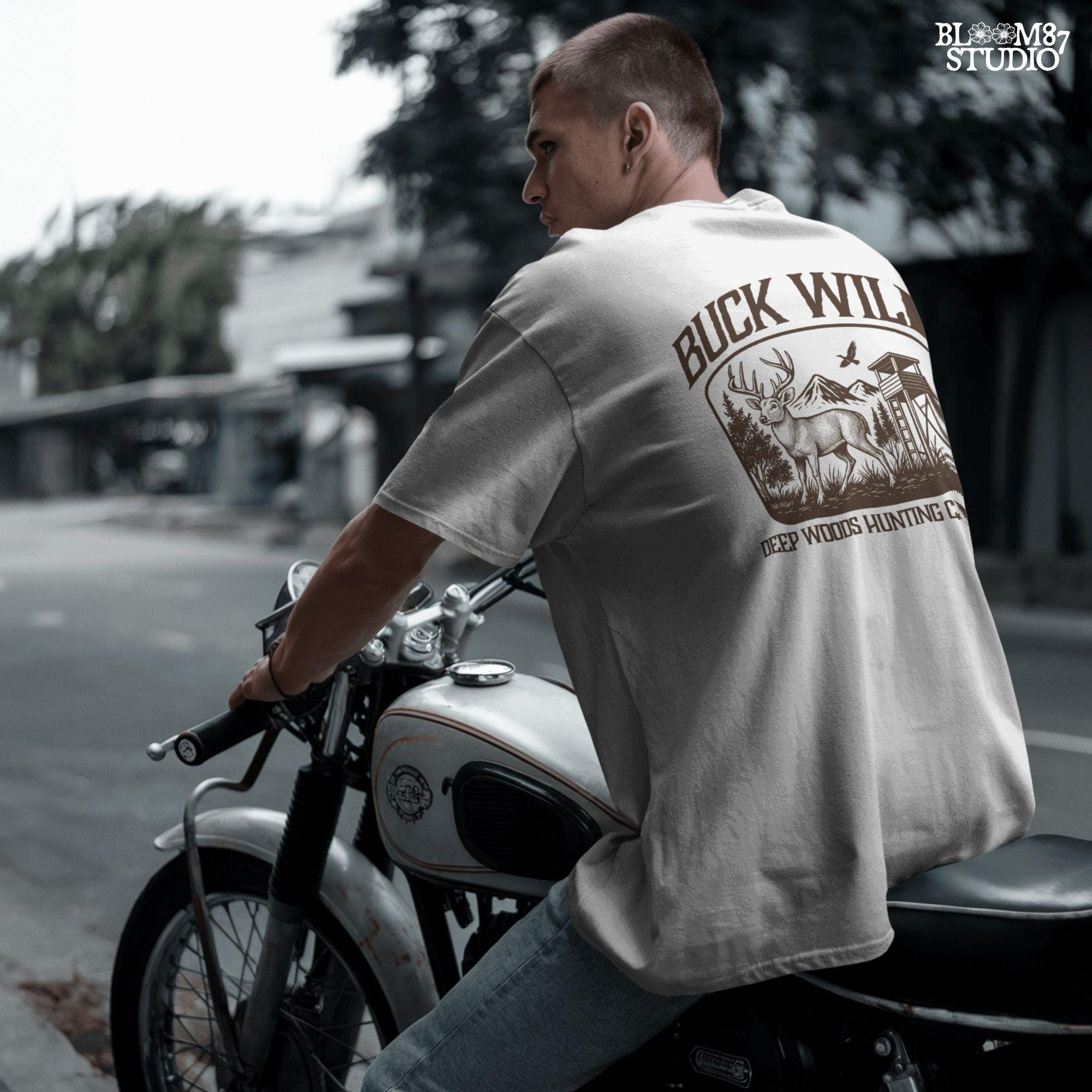 Illustration of a buck in the forest with mountains, a watchtower, and a bird, framed by the text “Buck Wild – Deep Woods Hunting Club”.