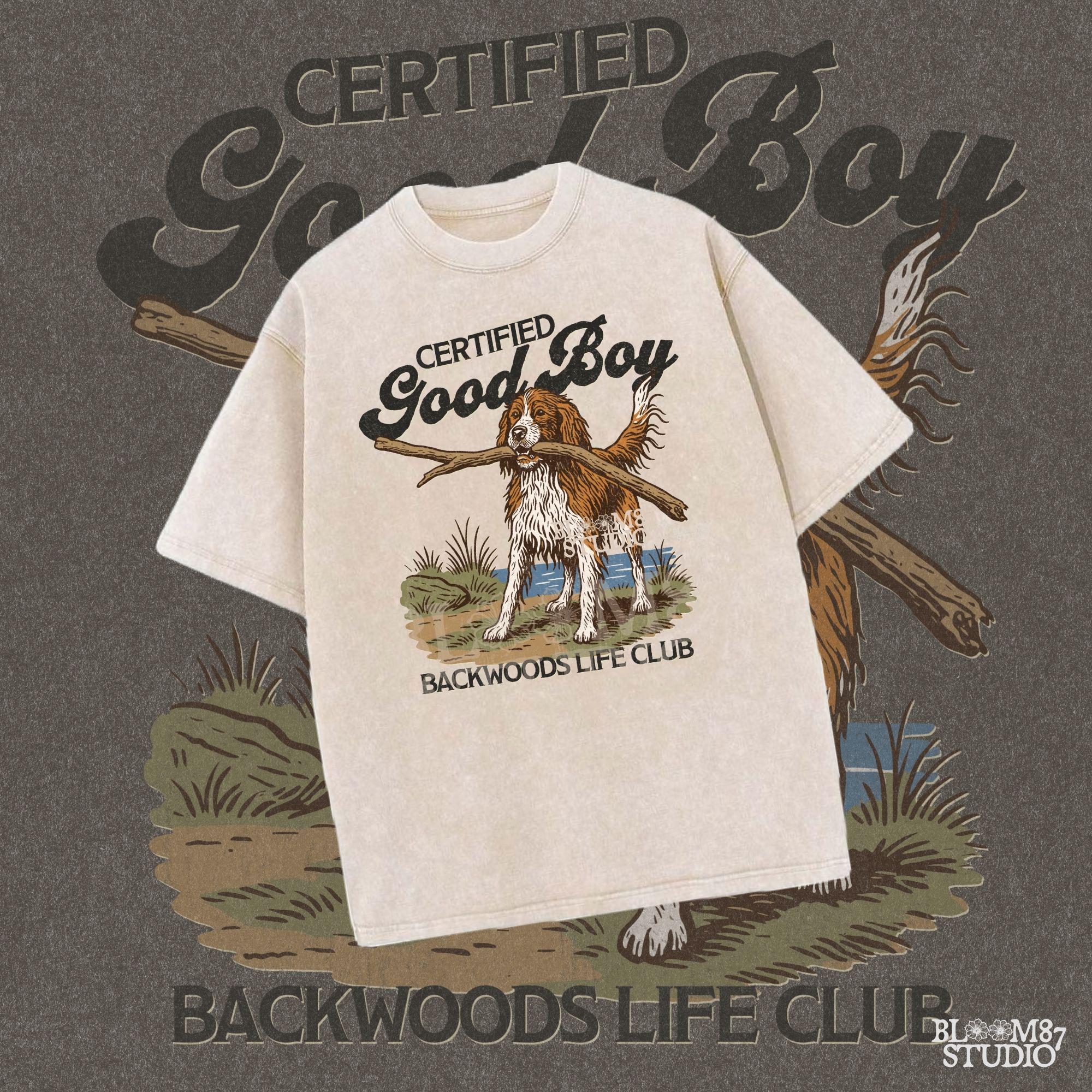 Brittany Spaniel dog holding a stick with text Certified Good Boy and Backwoods Life Club, rustic hunting dog art