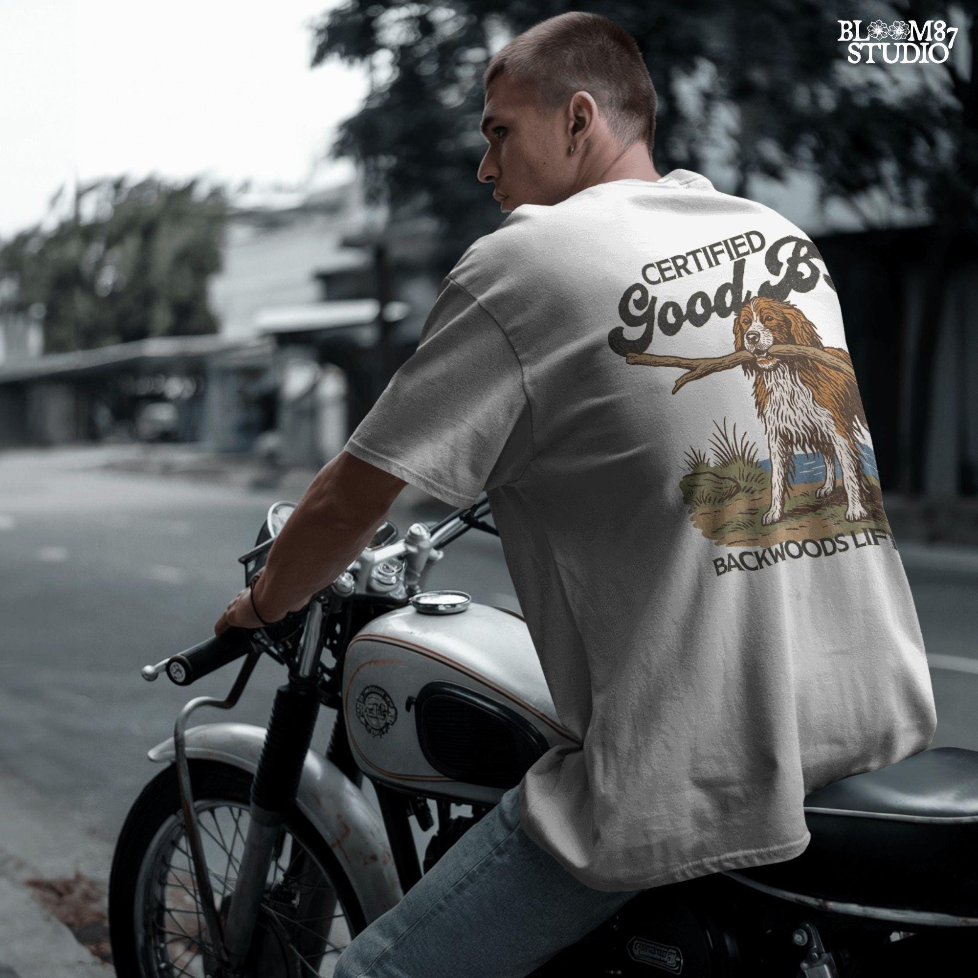 Brittany Spaniel dog holding a stick with text Certified Good Boy and Backwoods Life Club, rustic hunting dog art