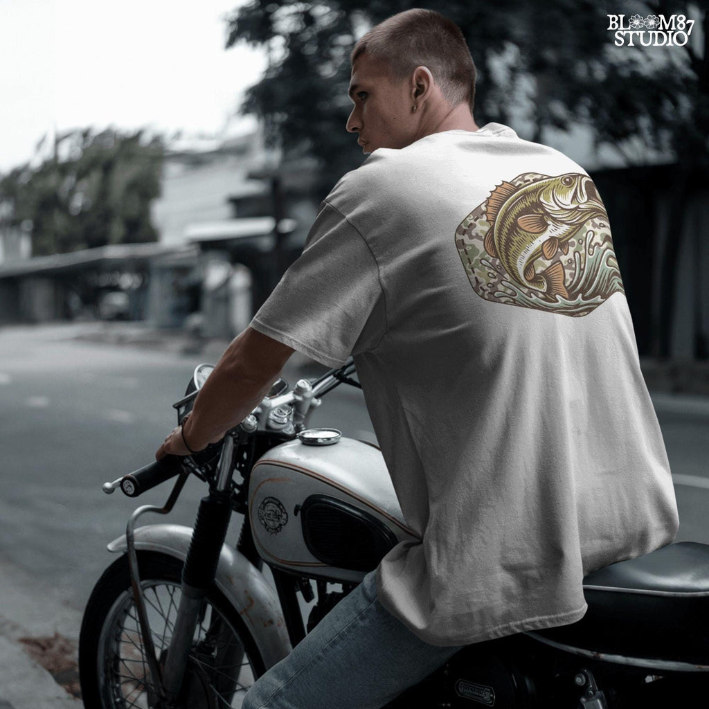 Jumping bass fish over camouflage background with splashing water, perfect for summer fishing and patriotic outdoor-themed designs.