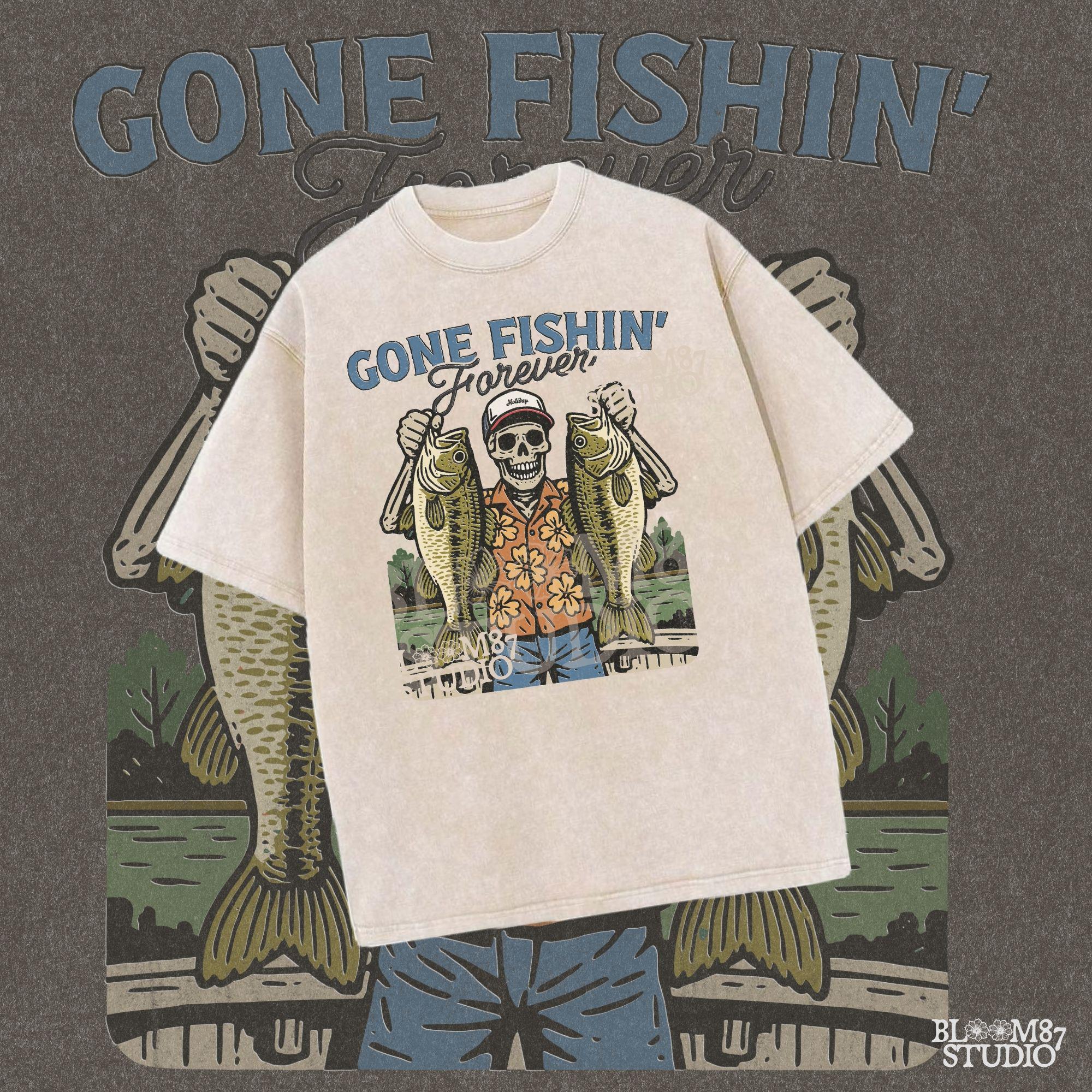 A skeleton wearing a red cap and orange floral shirt stands on a dock holding two large bass fish with the words “Gone Fishin’ Forever” above.