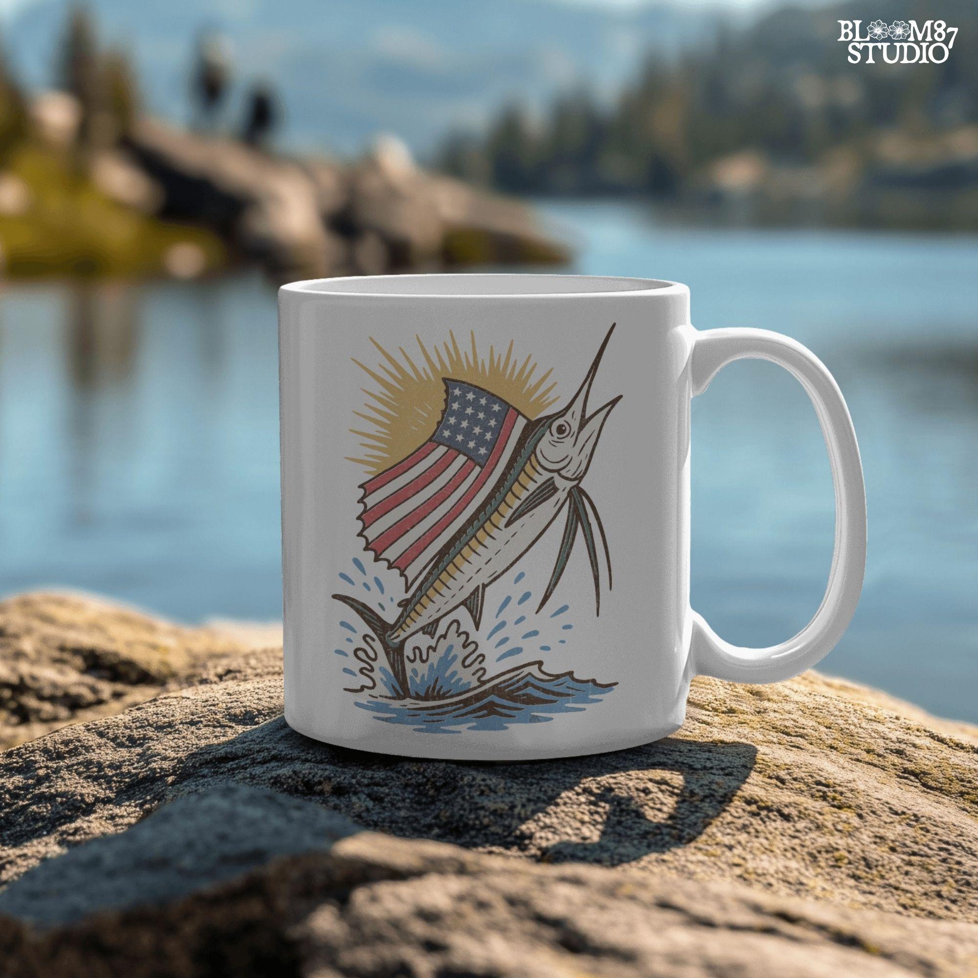 A jumping marlin with a large sail shaped like the American flag, splashing out of the ocean with sun rays in the background.