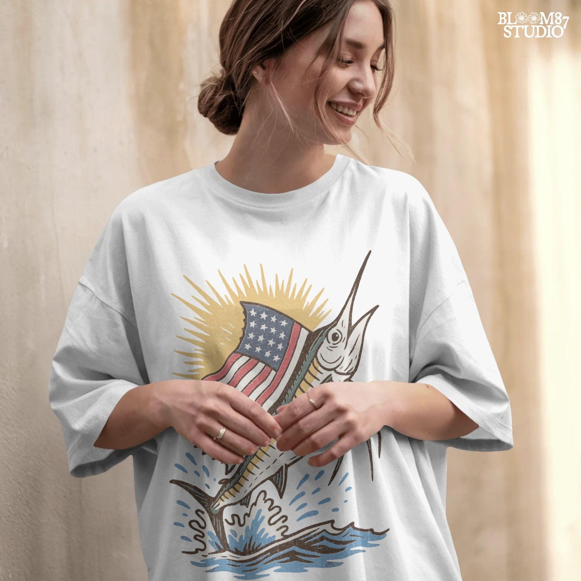 A jumping marlin with a large sail shaped like the American flag, splashing out of the ocean with sun rays in the background.