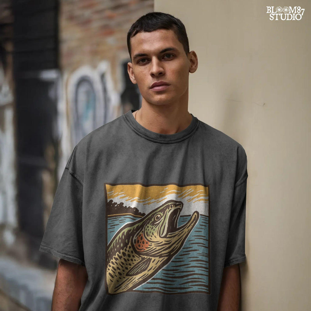 Vintage woodcut-style illustration of a trout fish leaping from the water at sunset, with a bold orange sky and retro color palette.