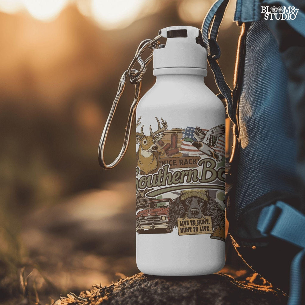 Collage-style design with deer, duck, hunting dog, vintage truck, shotgun, and camo background with the phrase “Southern Boy” in bold script.