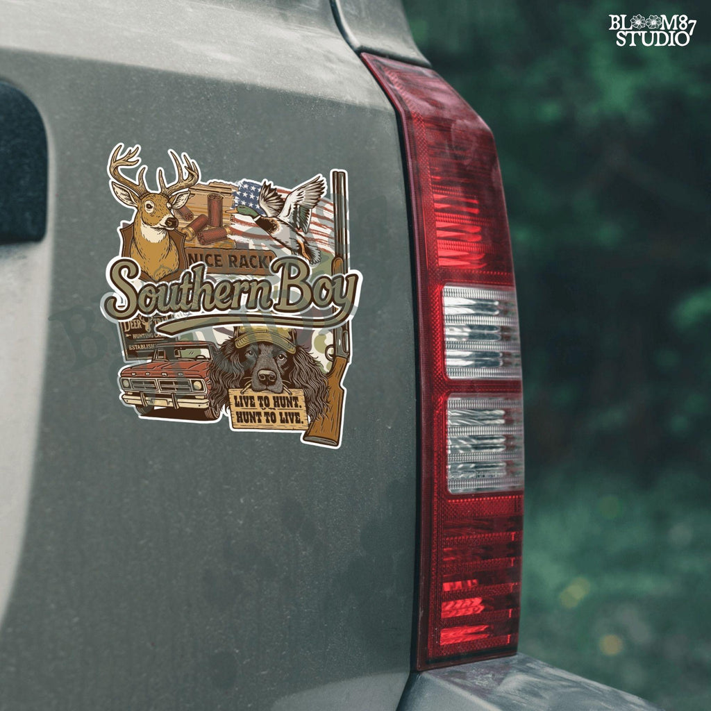 Collage-style design with deer, duck, hunting dog, vintage truck, shotgun, and camo background with the phrase “Southern Boy” in bold script.