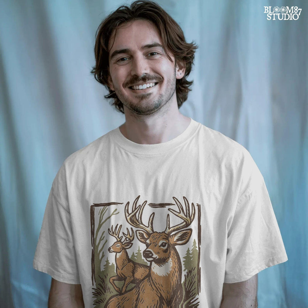 Hand-drawn illustration of two whitetail deer bucks in a forest, one seated and one alert in the background.