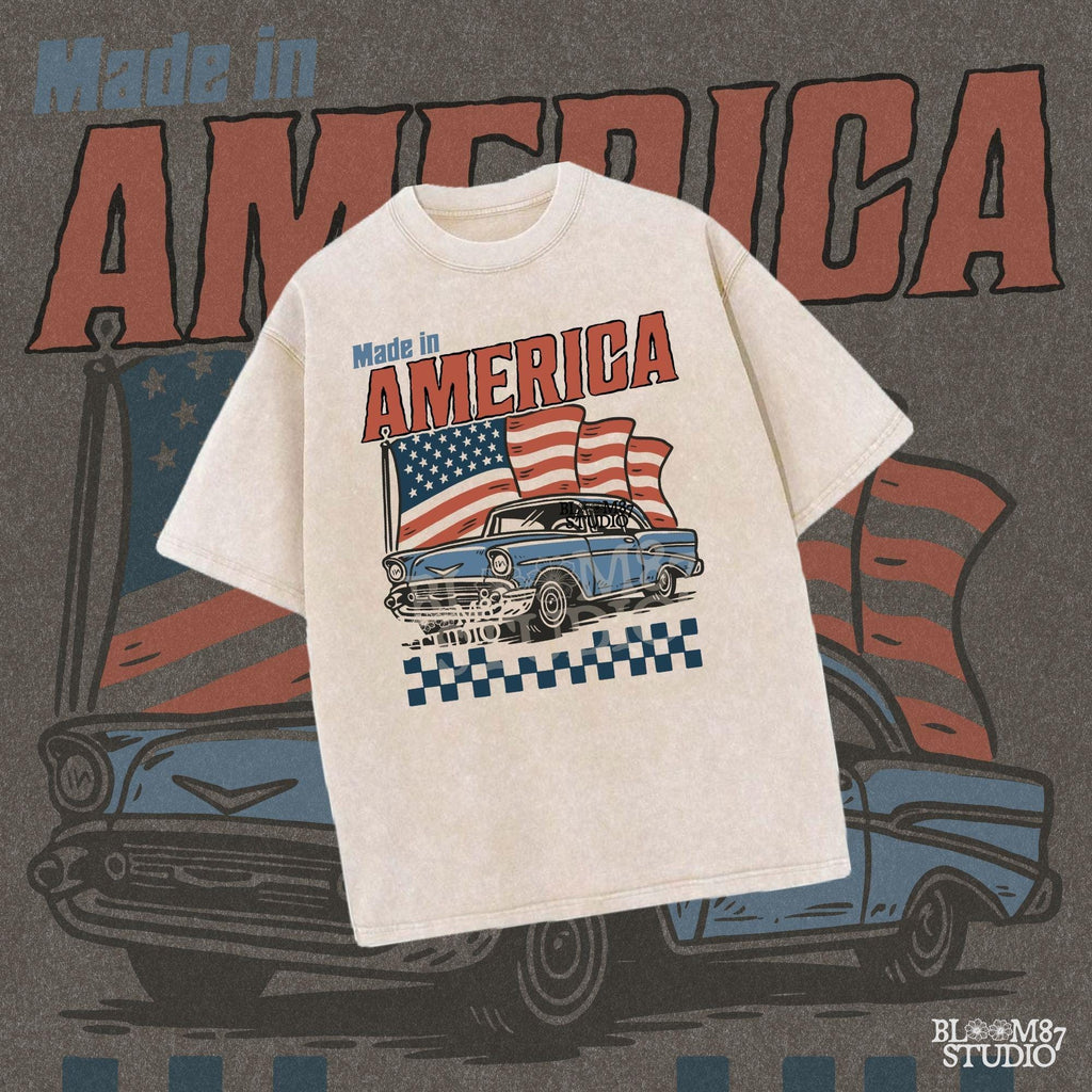 Classic American vintage car driving in front of three waving USA flags with “Made in America” text in bold retro style.