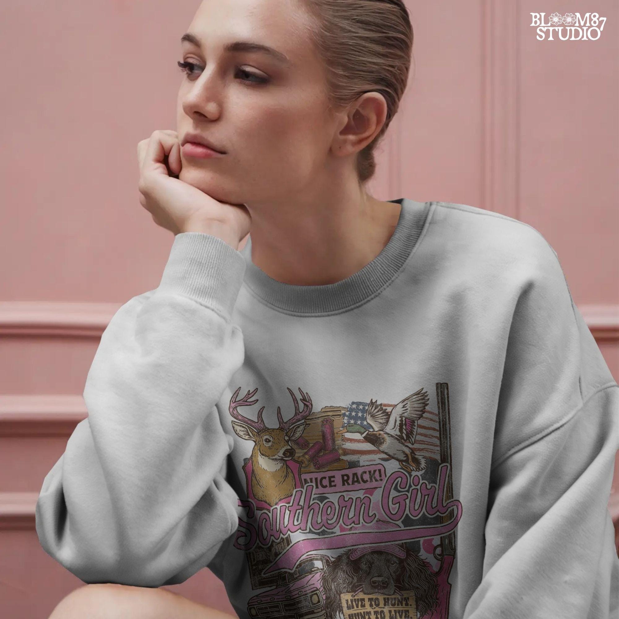 Patriotic hunting collage featuring “Southern Girl” text with deer, duck, pink shotgun, truck, and a dog holding a “Live to Hunt” sign in a pink and camo aesthetic.