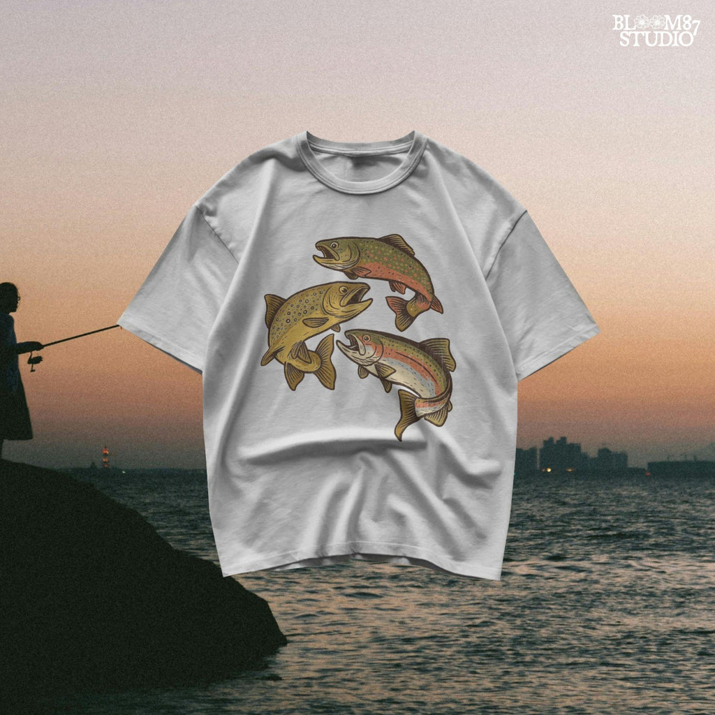 Illustration of rainbow trout, brook trout, and brown trout in colorful, vintage-style drawing with open mouths and detailed markings.