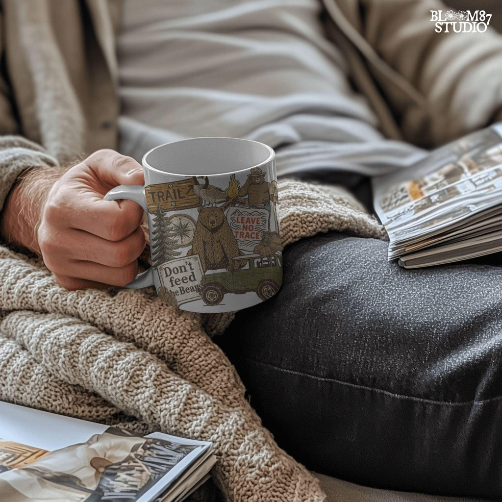Illustration of a camping-themed collage featuring a grizzly bear, “Leave No Trace” sign, Smokey the Bear, trail sign, compass, boots, a green jeep, and forest scenery.