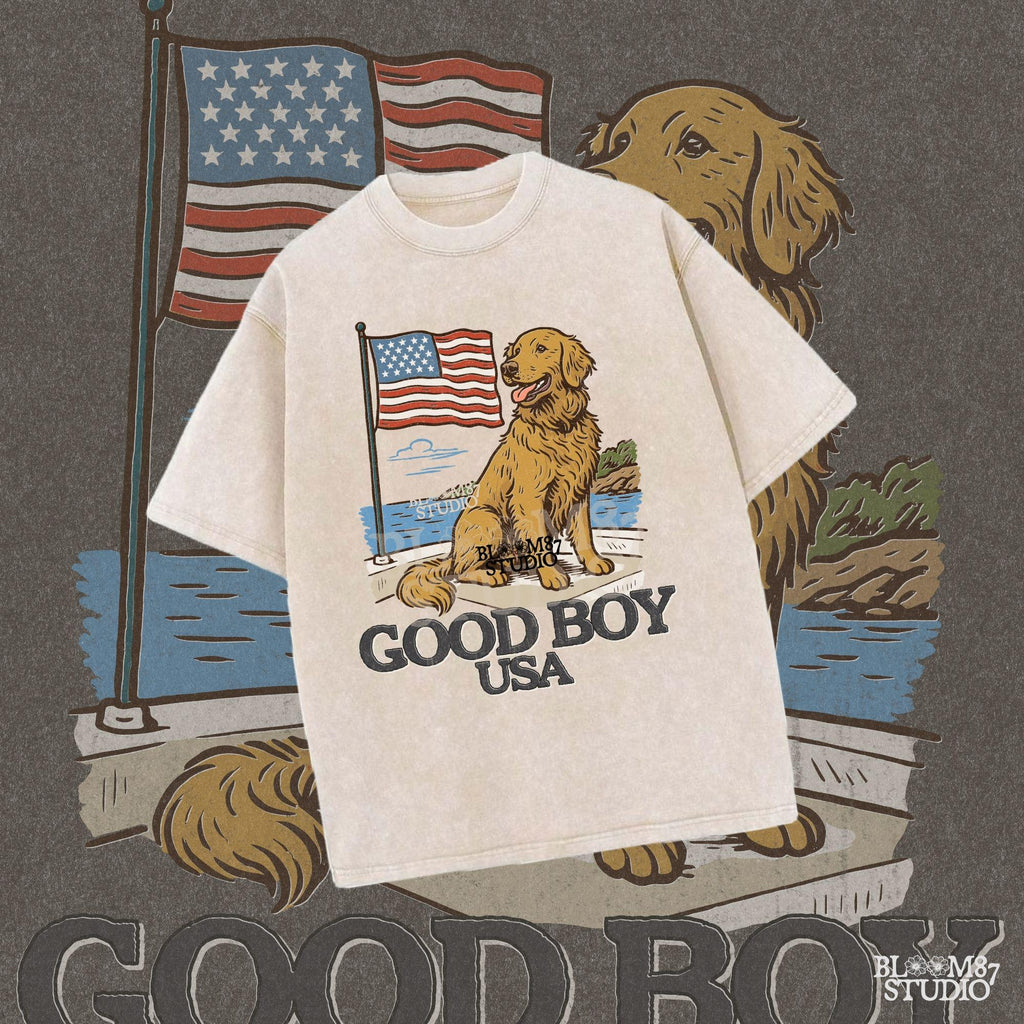 Golden retriever sitting proudly in front of the American flag with “Good Boy USA” text below, patriotic dog design