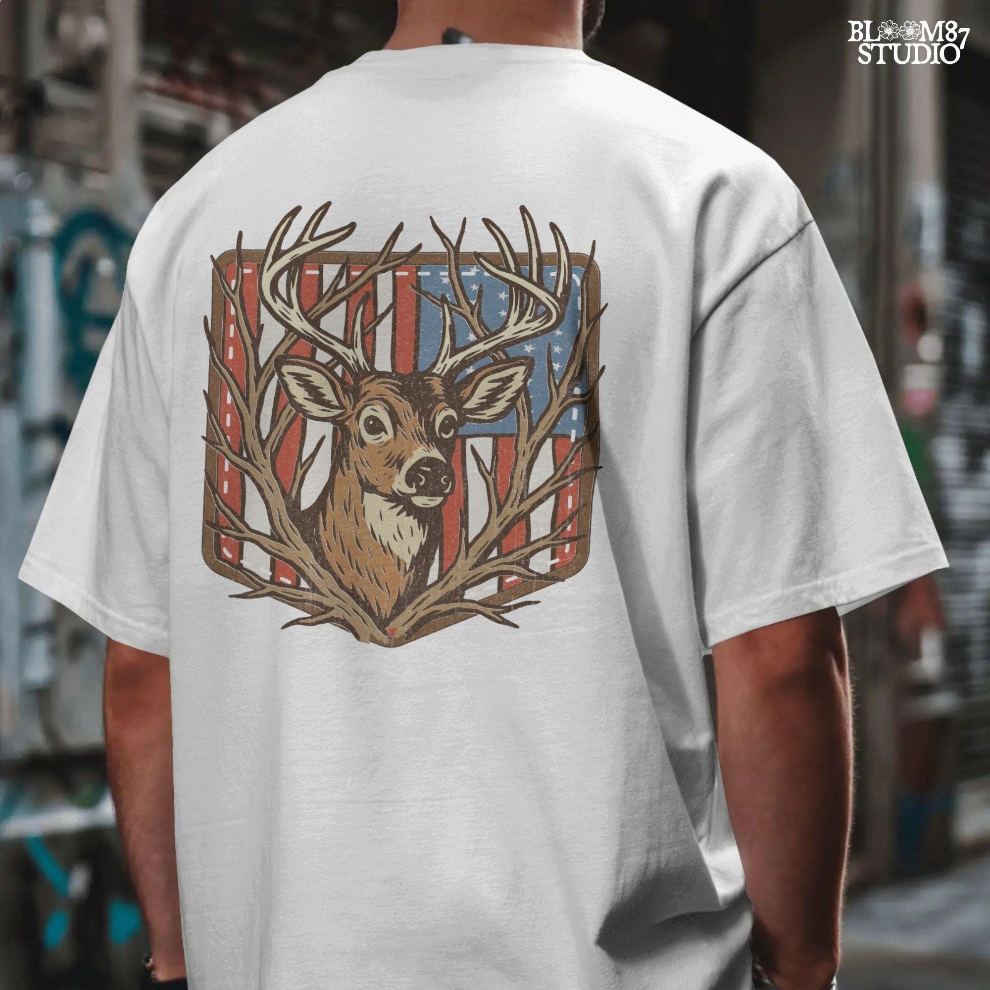 Illustration of a proud buck with large antlers standing in front of a stitched American flag patch, rustic hunting style.