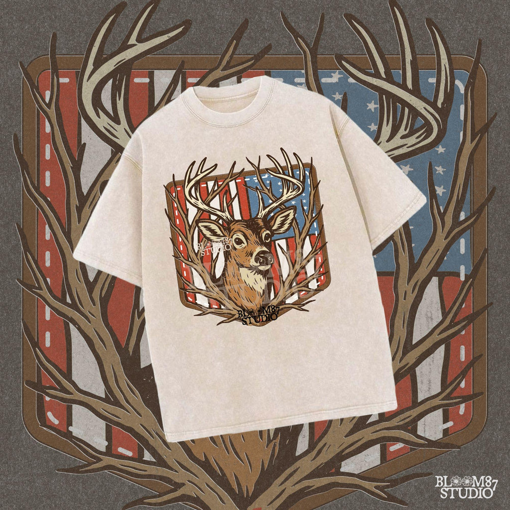Illustration of a proud buck with large antlers standing in front of a stitched American flag patch, rustic hunting style.
