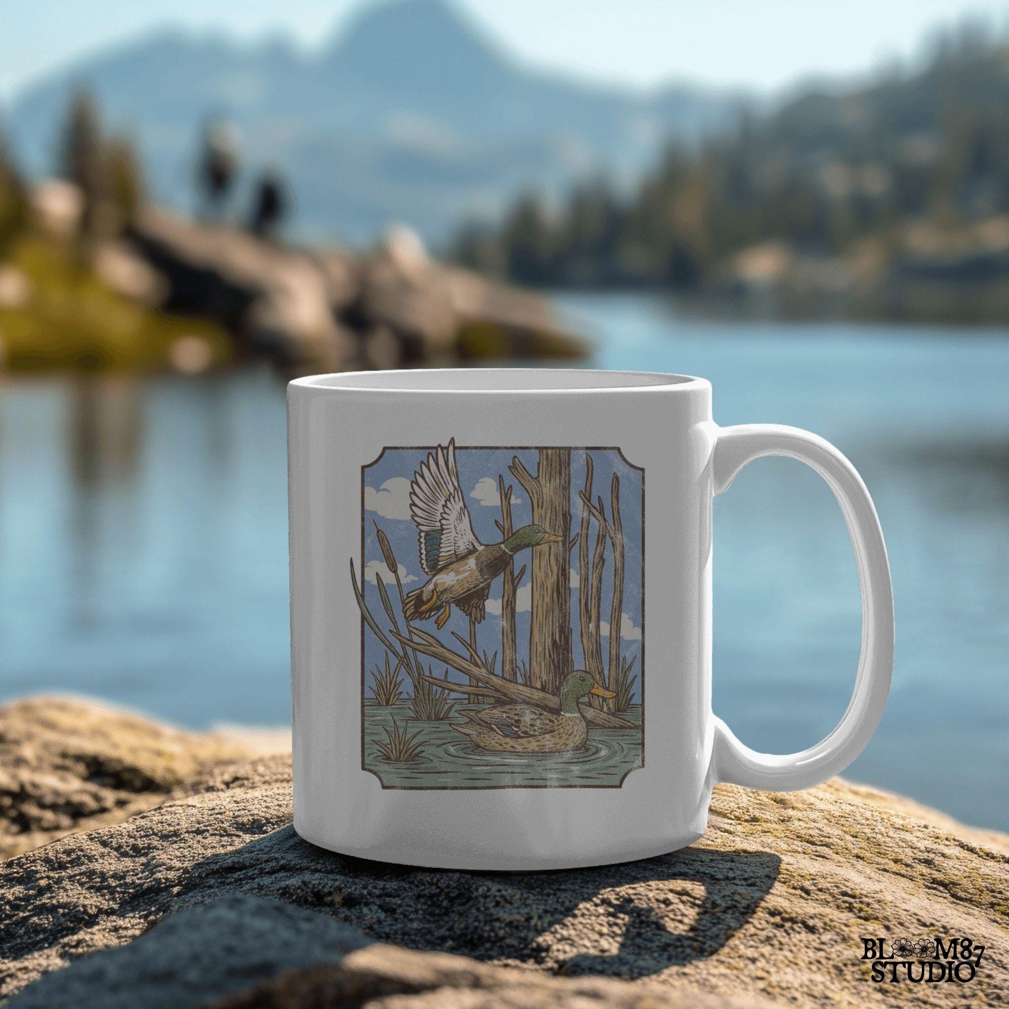 “Vintage mallard duck PNG, flying and swimming ducks in swamp with trees, classic waterfowl hunting scene sublimation”