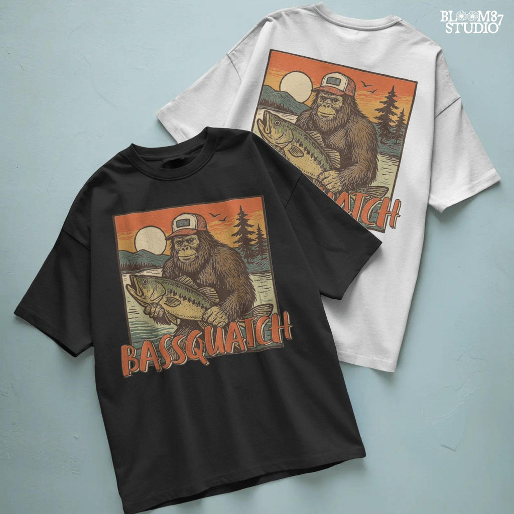 Bigfoot holding a large bass at sunset with summer lake background and the word “Bassquatch” in bold orange letters.