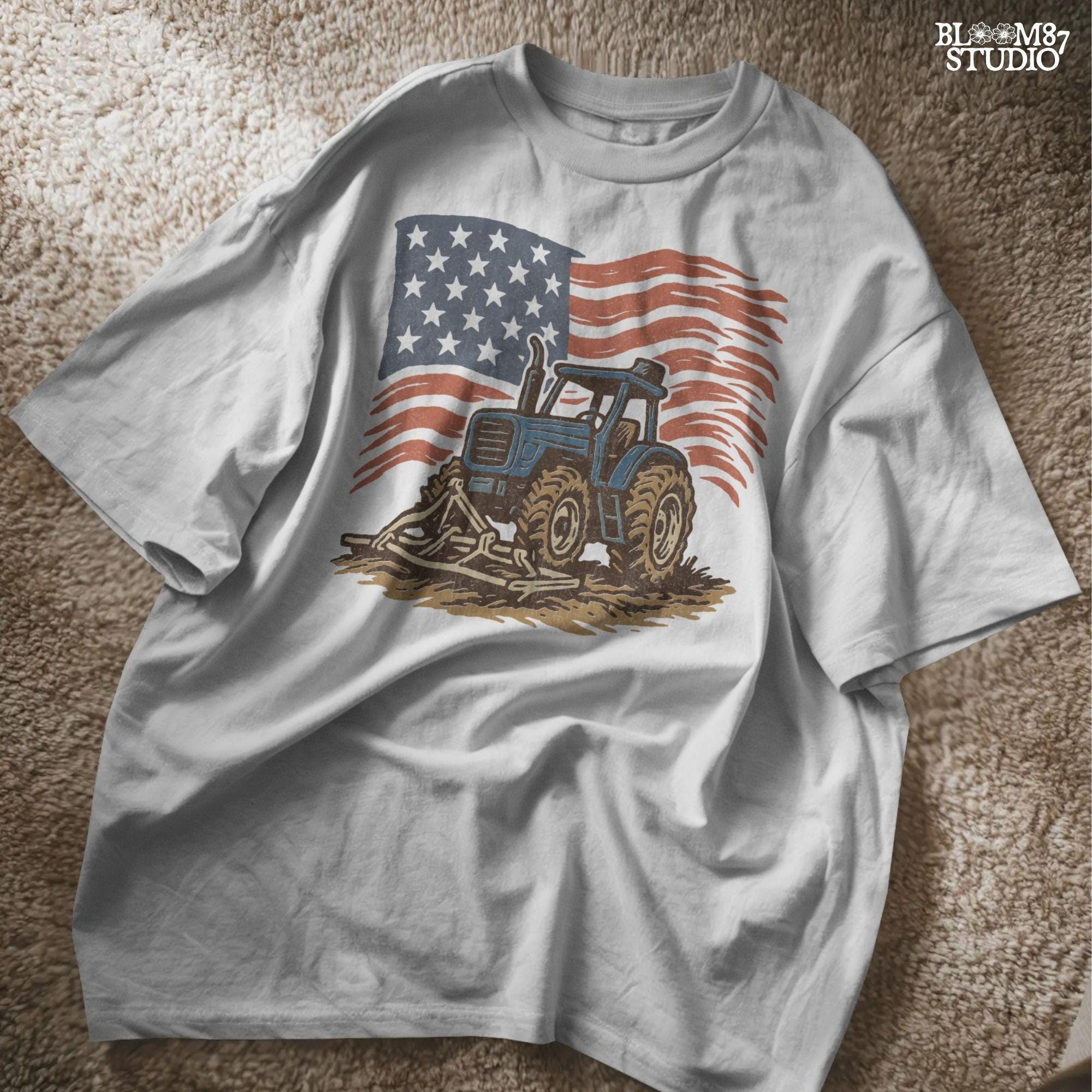 Red tractor with plow on soil, American flag waving in the background, vintage farm-themed graphic.