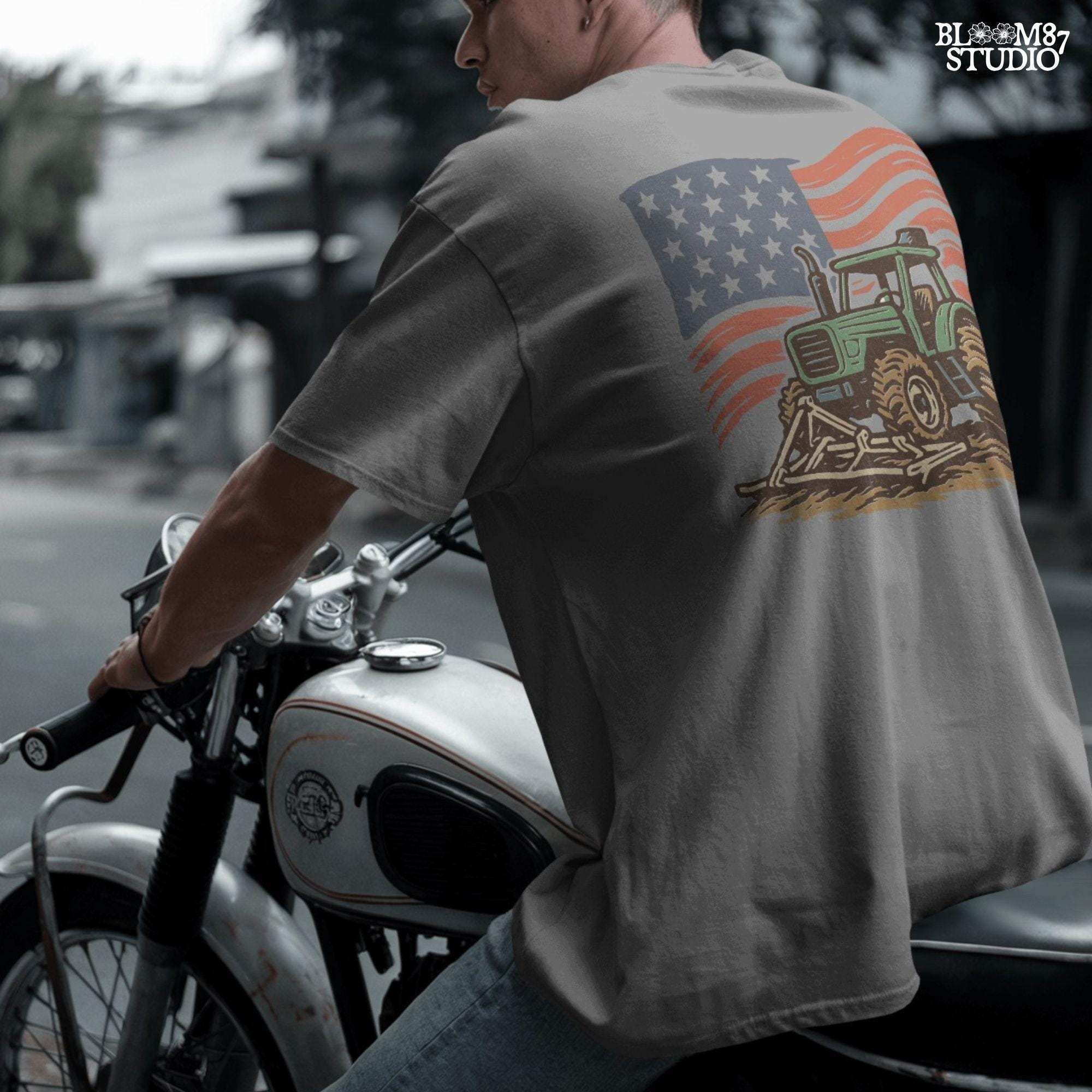 Red tractor with plow on soil, American flag waving in the background, vintage farm-themed graphic.