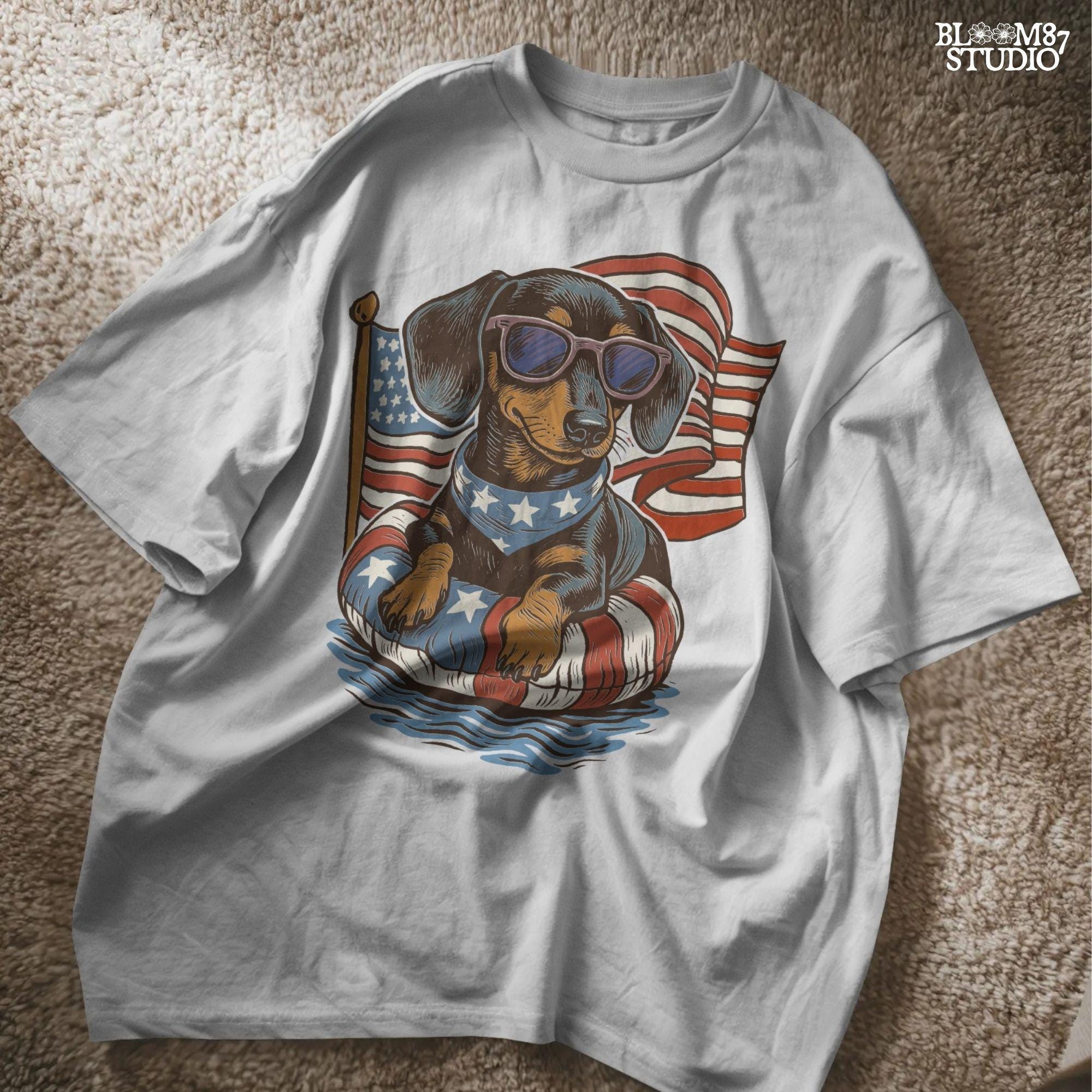 Cute dachshund dog with sunglasses on a USA-themed floatie, American flag background, perfect for 4th of July PNG sublimation.