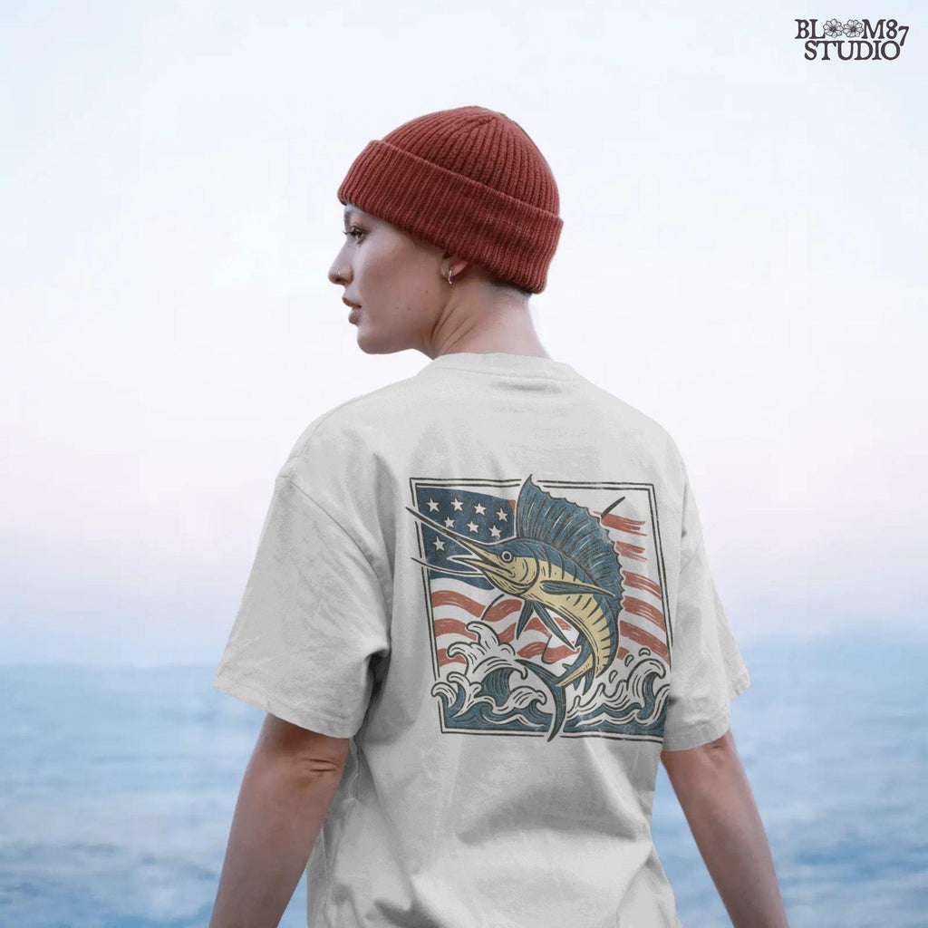 Patriotic sailfish illustration with American flag background and ocean waves – perfect for fishing shirt sublimation or saltwater angler clipart