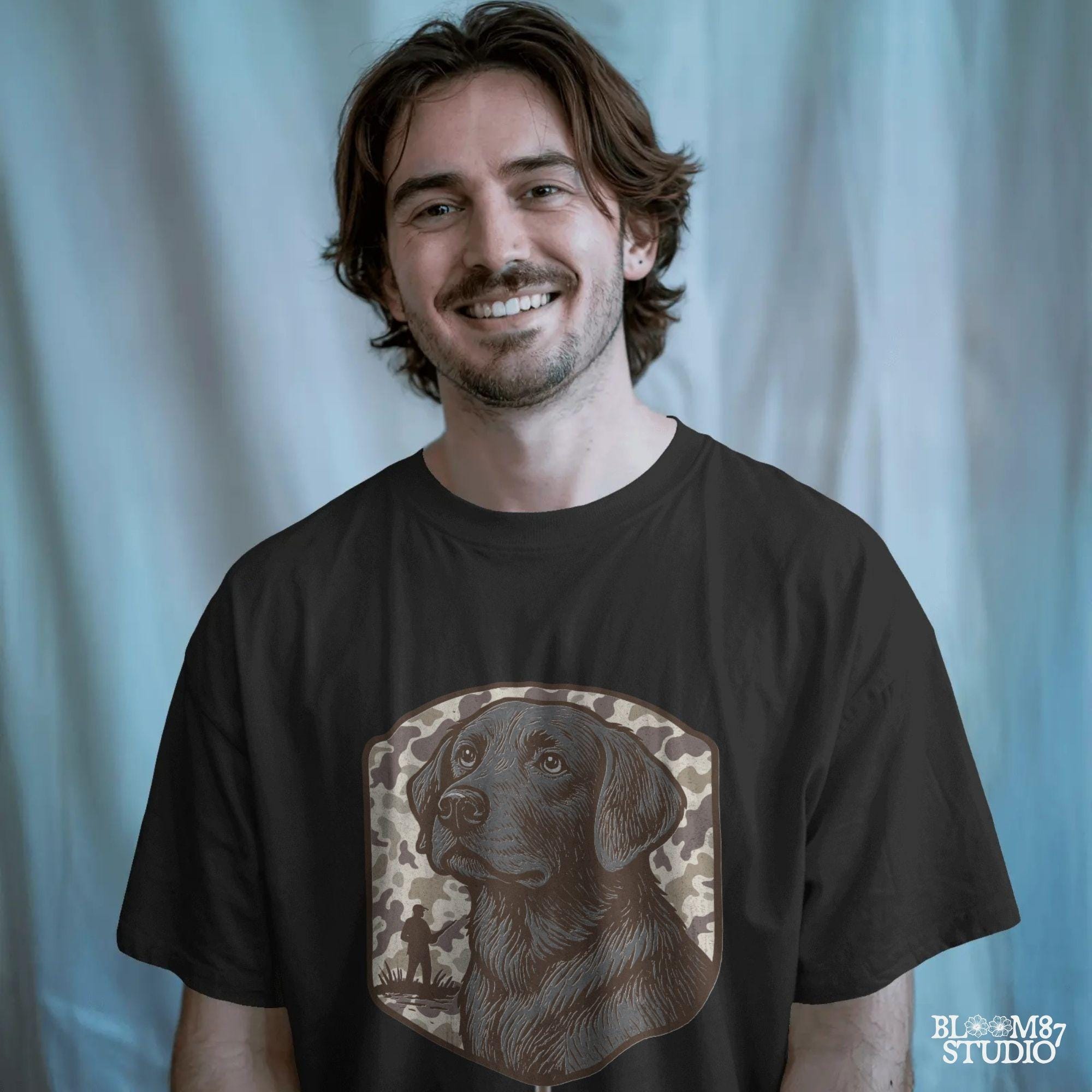 Hand-drawn black Labrador retriever with camo background and duck hunter silhouette – vintage-style sublimation design for outdoor lovers.