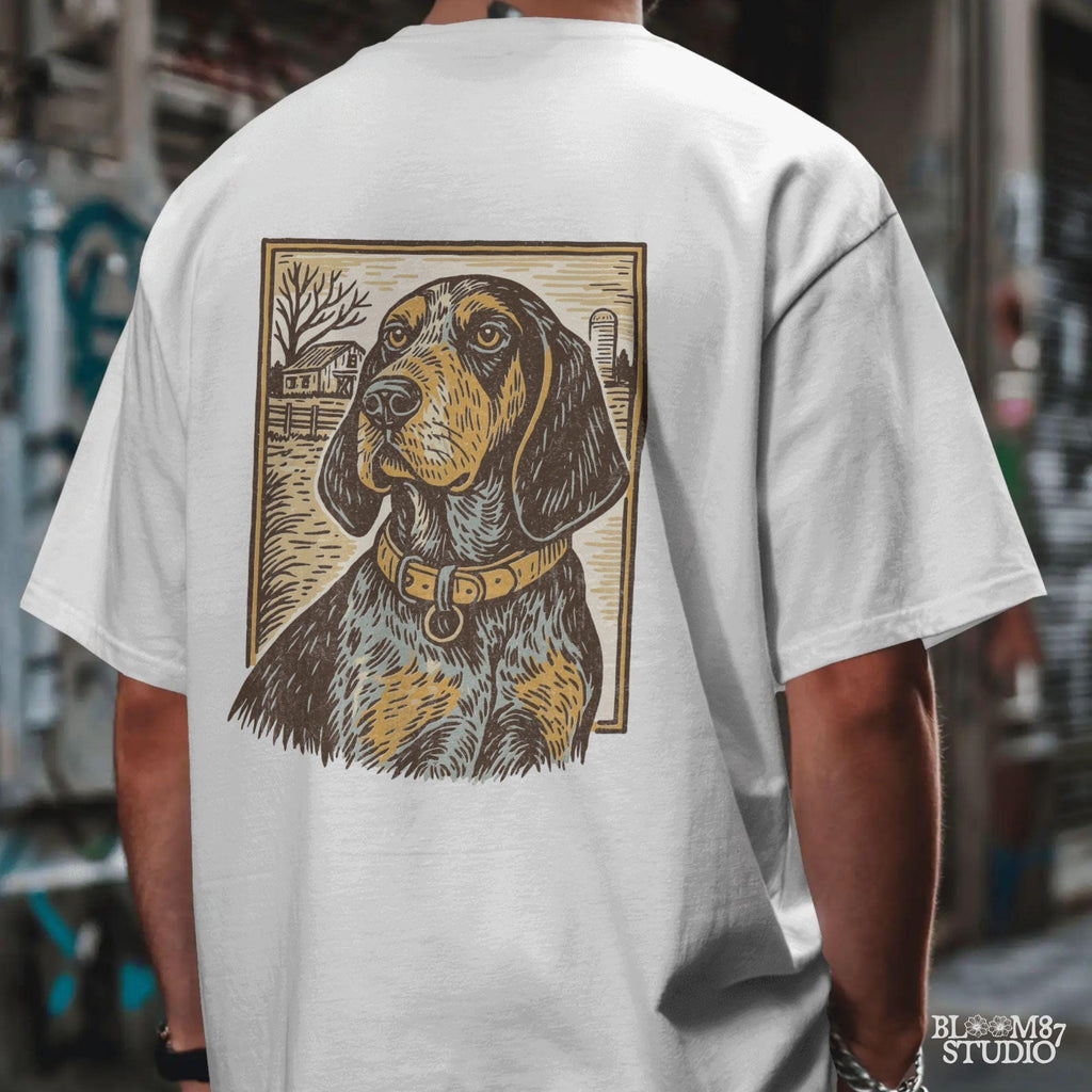 Vintage woodcut-style coonhound dog in front of a rustic farm scene – southern hunting dog sublimation design.