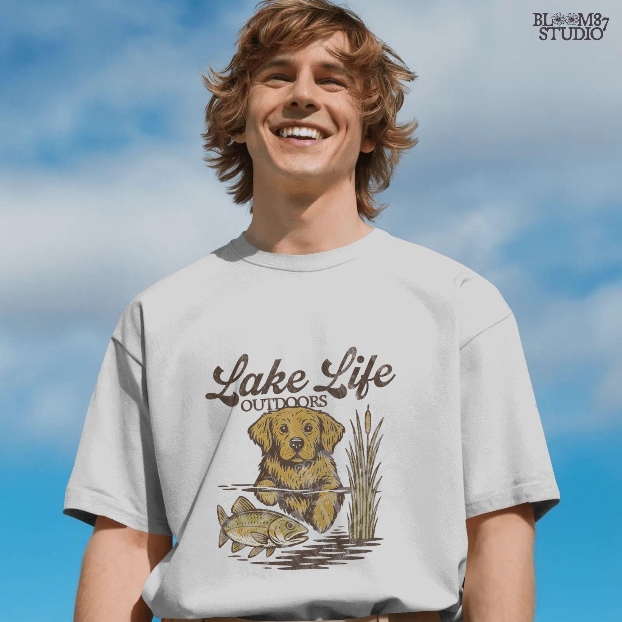 Golden Retriever dog enjoying lake life outdoors with fish in rustic nature setting — perfect for lake house and fishing sublimation designs