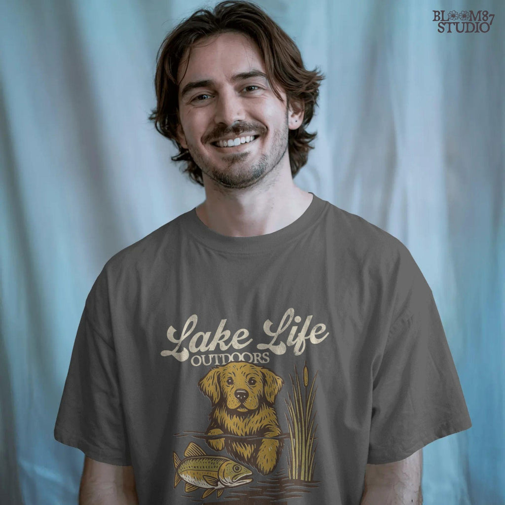 Golden Retriever dog enjoying lake life outdoors with fish in rustic nature setting — perfect for lake house and fishing sublimation designs