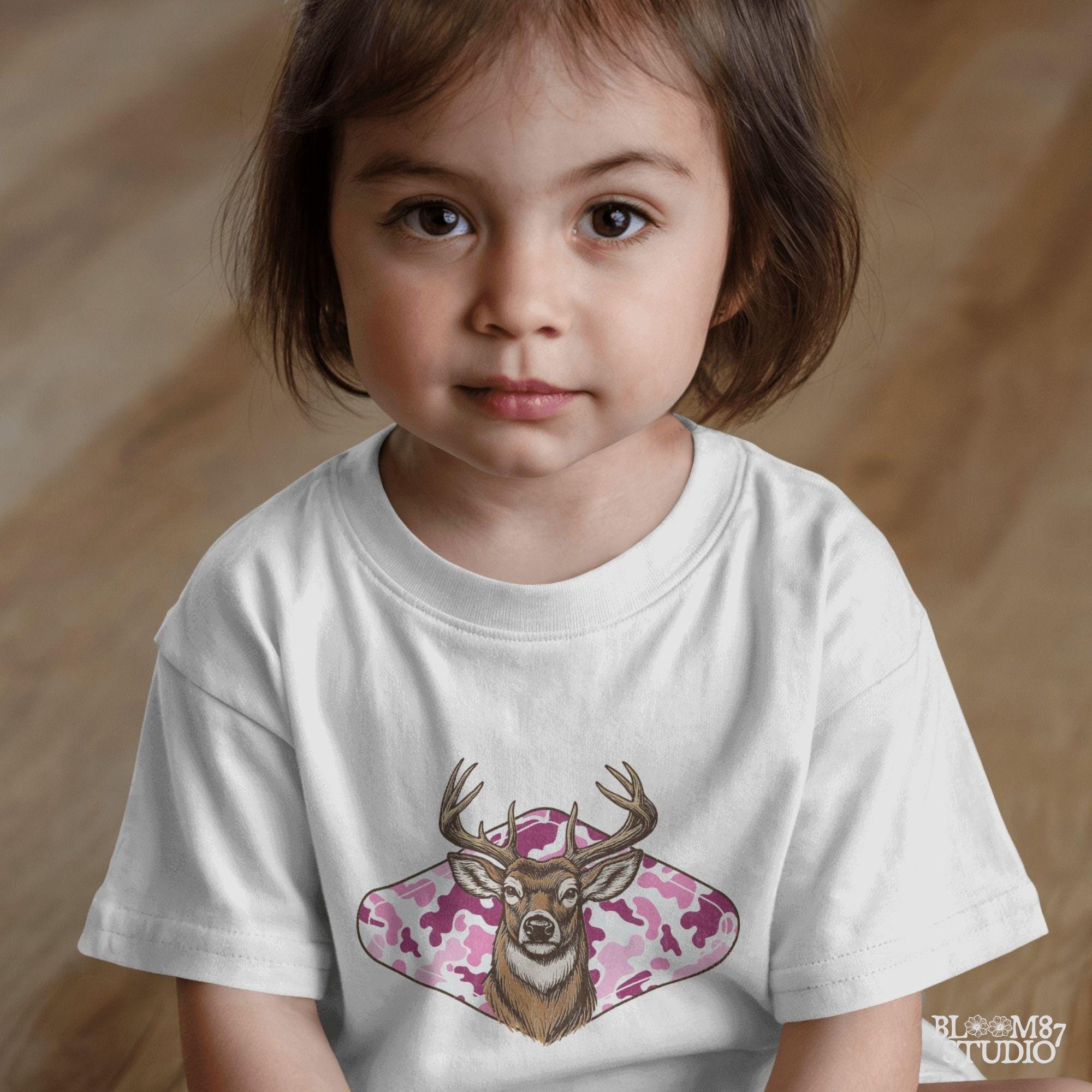 Whitetail deer with antlers over pink camo background – rustic girl hunter sublimation design.