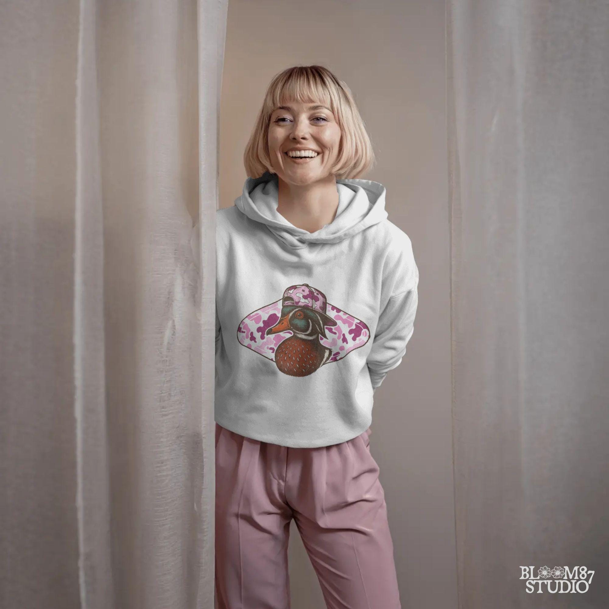 Funny wood duck in pink camo hat with pink camo background – cute sublimation design for girl hunters or southern women.