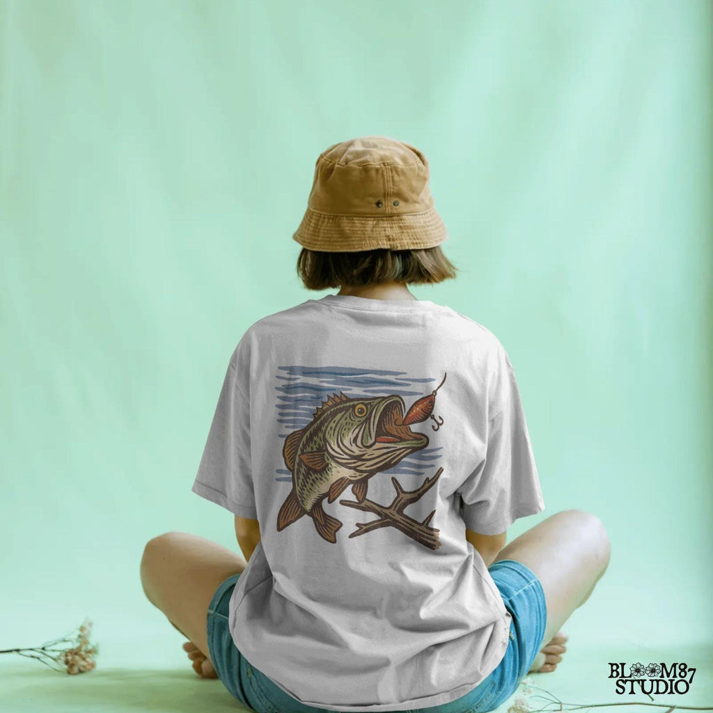 Vintage largemouth bass catching red lure underwater with rustic woodcut illustration style.